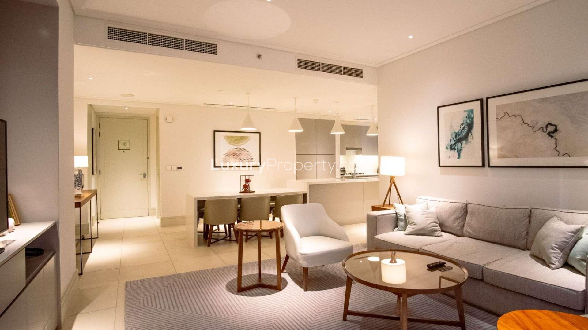Modern living room in Downtown Dubai apartment, Vida Residence, with elegant decor and ample lighting