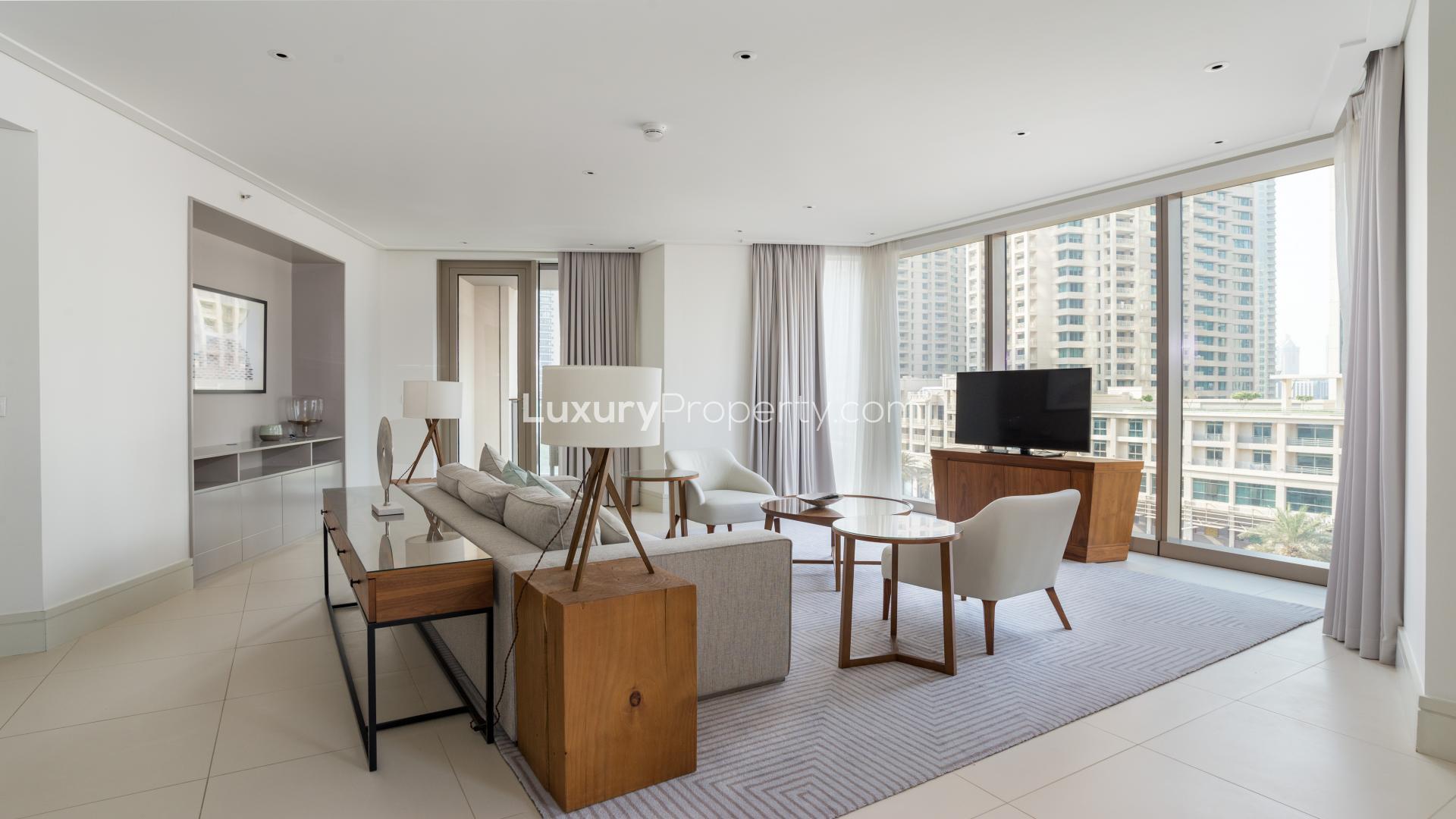 Gorgeous living area in serviced apartment at Vida Residence, Downtown Dubai, with modern furnishings