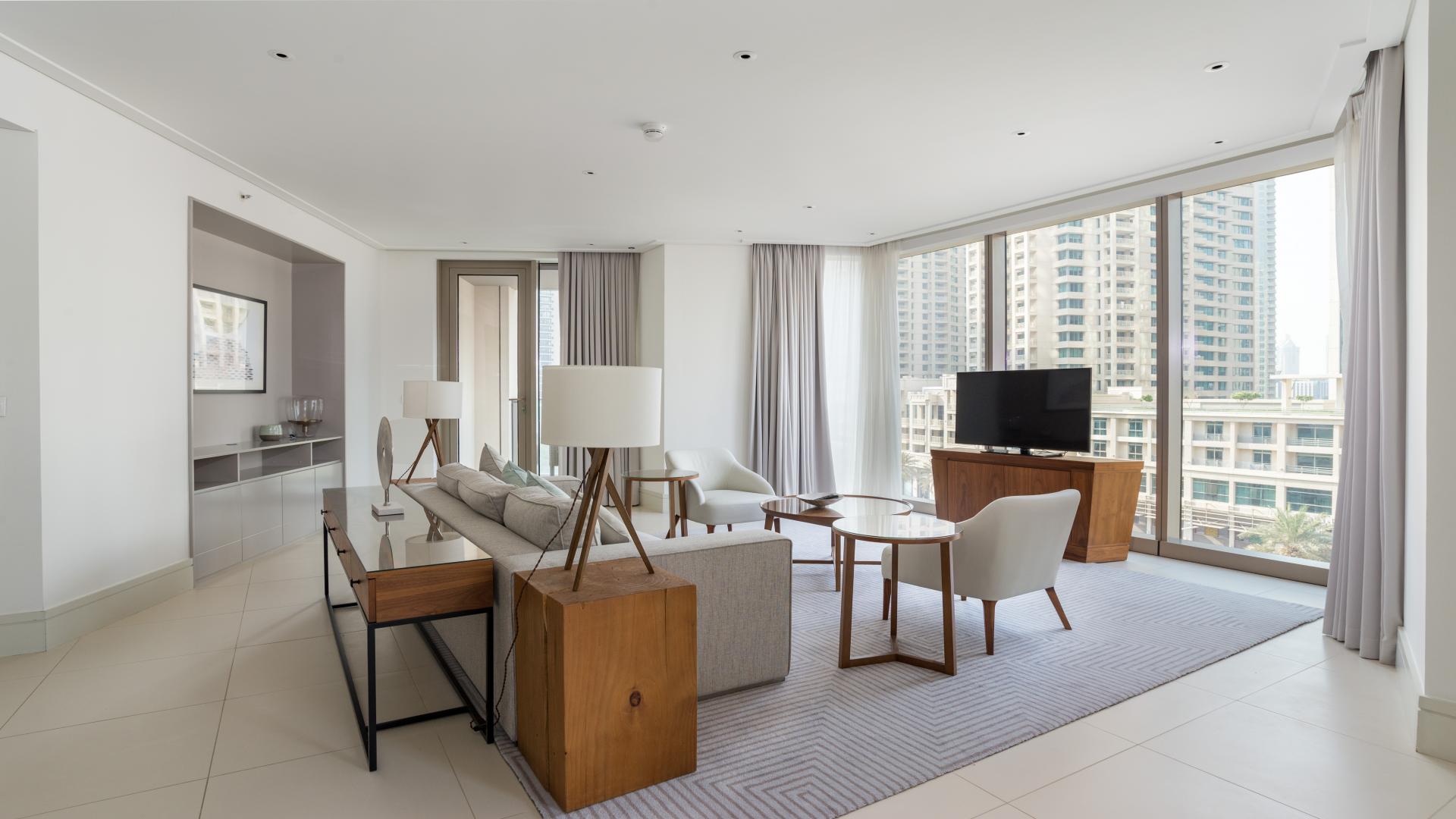 Gorgeous living area in serviced apartment at Vida Residence, Downtown Dubai, with modern furnishings