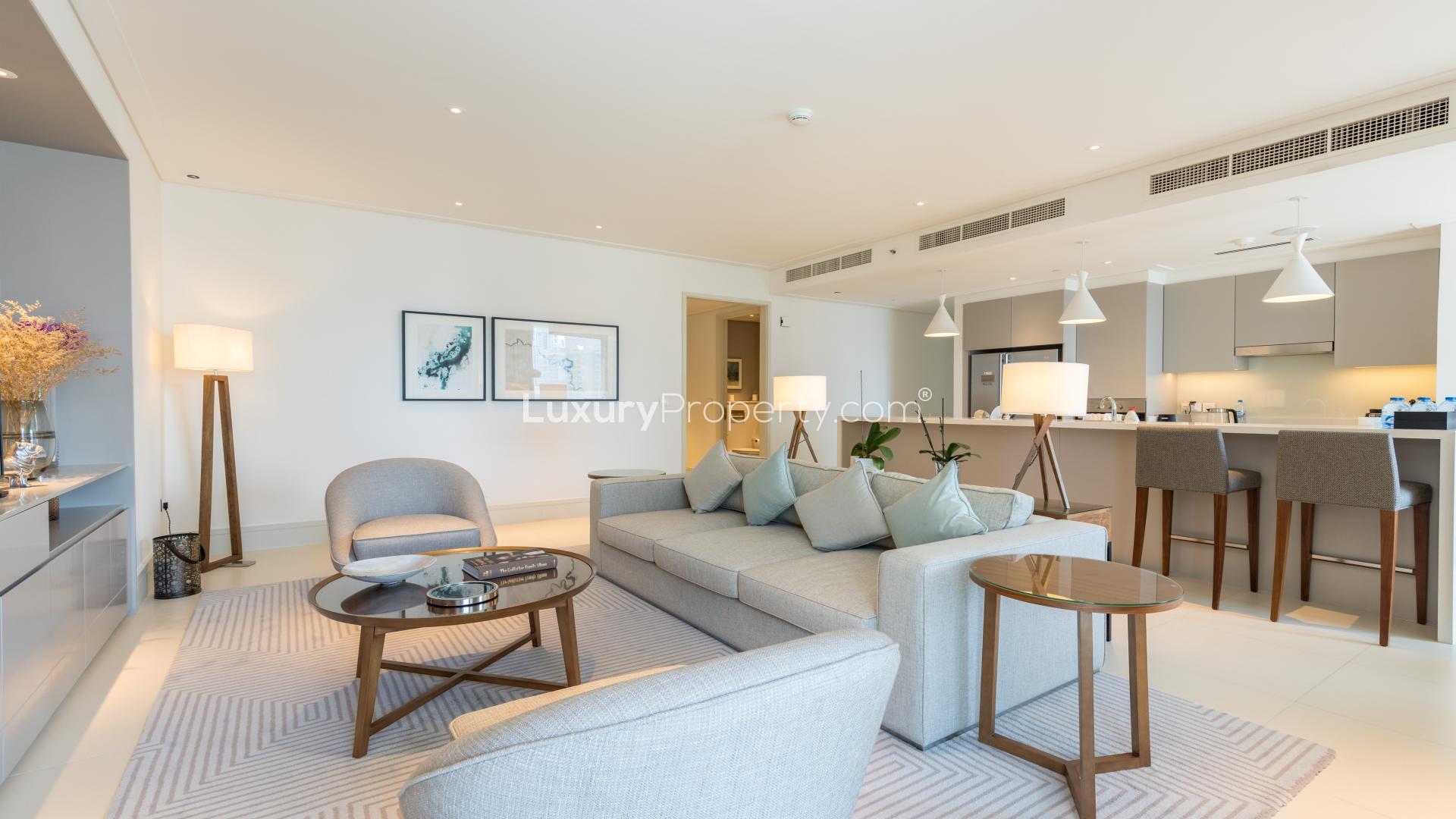 Modern kitchen and dining area in spacious two-bedroom apartment, Vida Residence Downtown Dubai