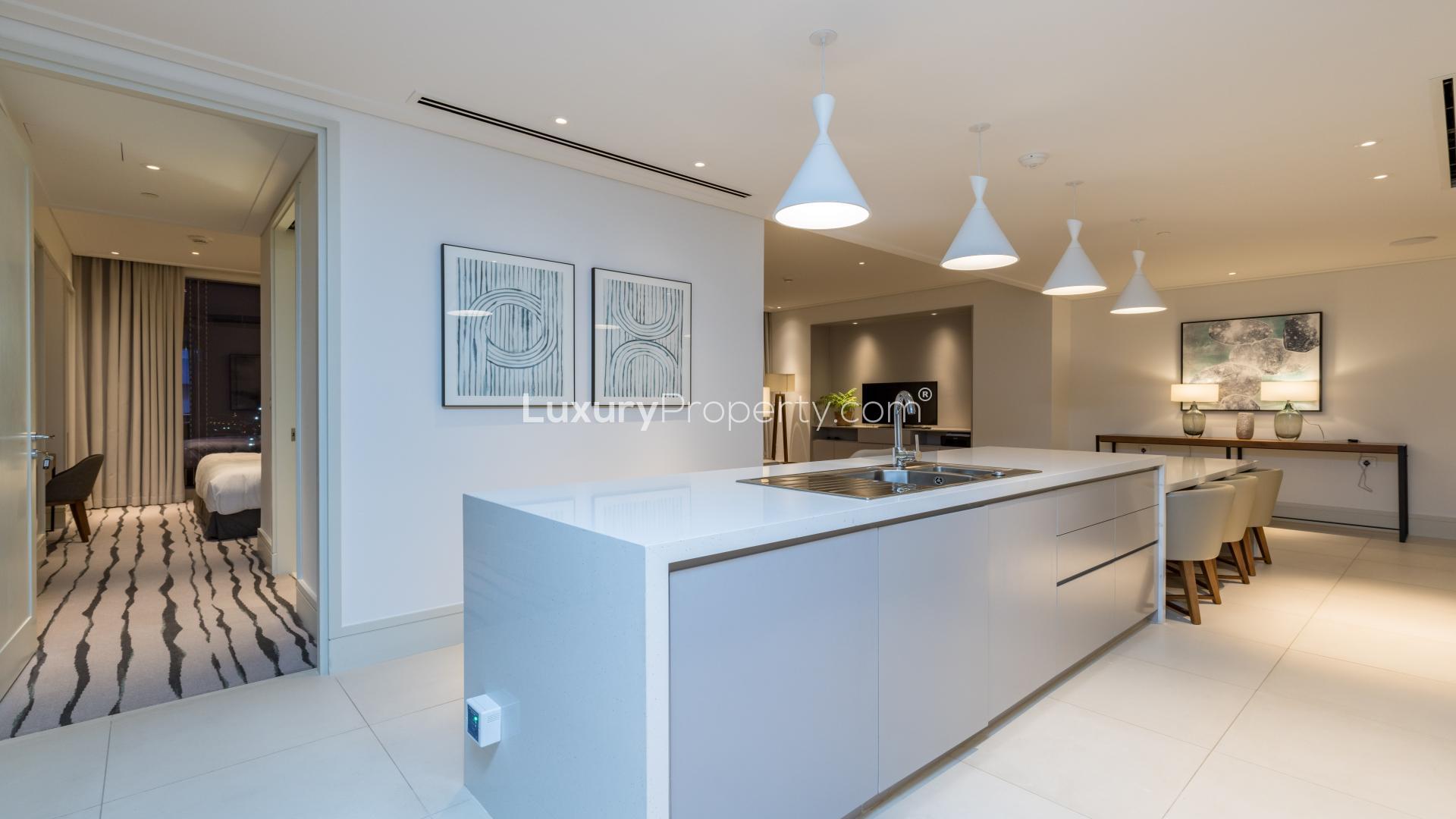 Modern kitchen and dining area in fully furnished 2-bedroom apartment, Vida Residence, Downtown Dubai