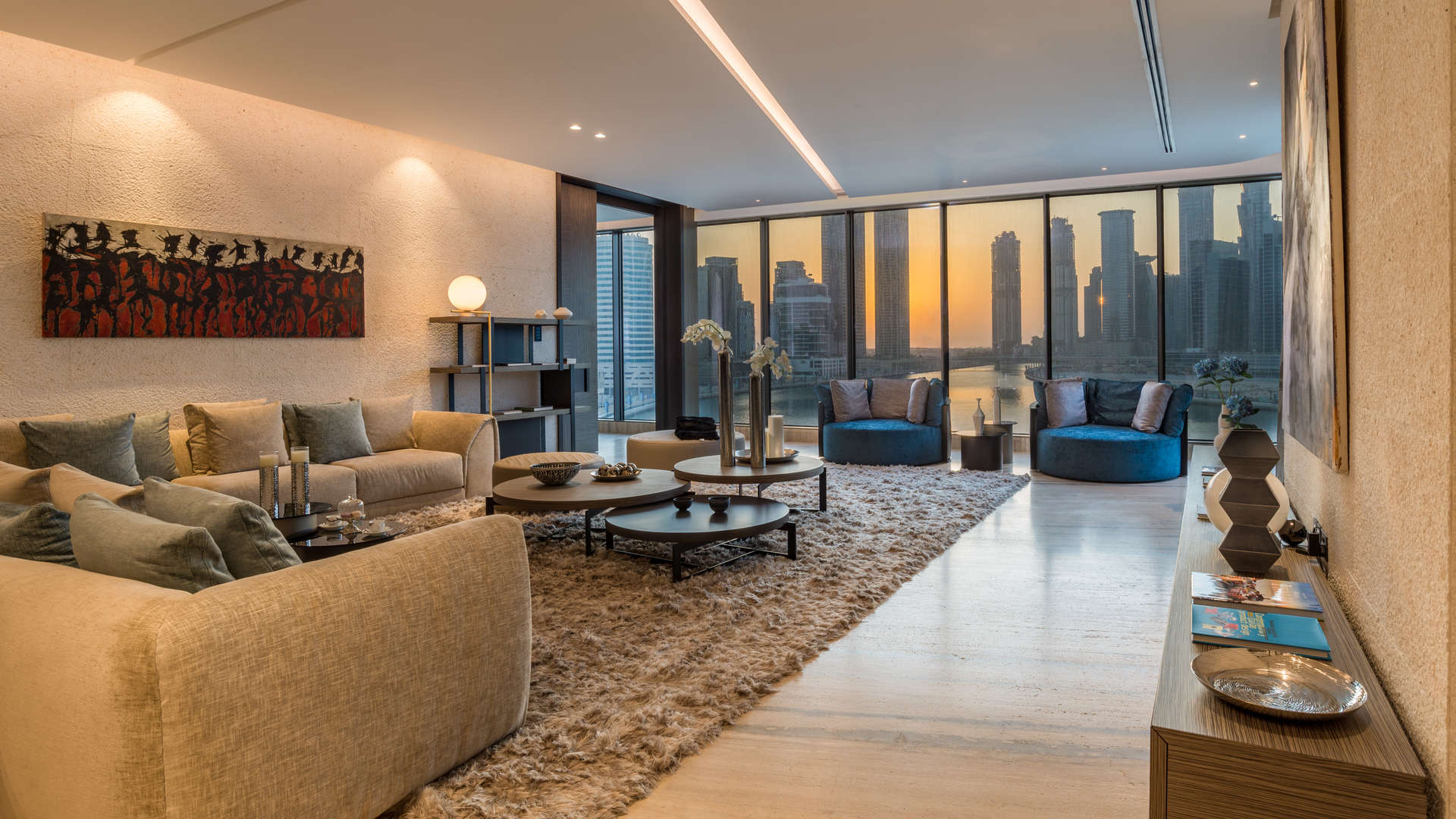 Elegant open-plan living area in Volante Tower apartment, Business Bay, with canal views