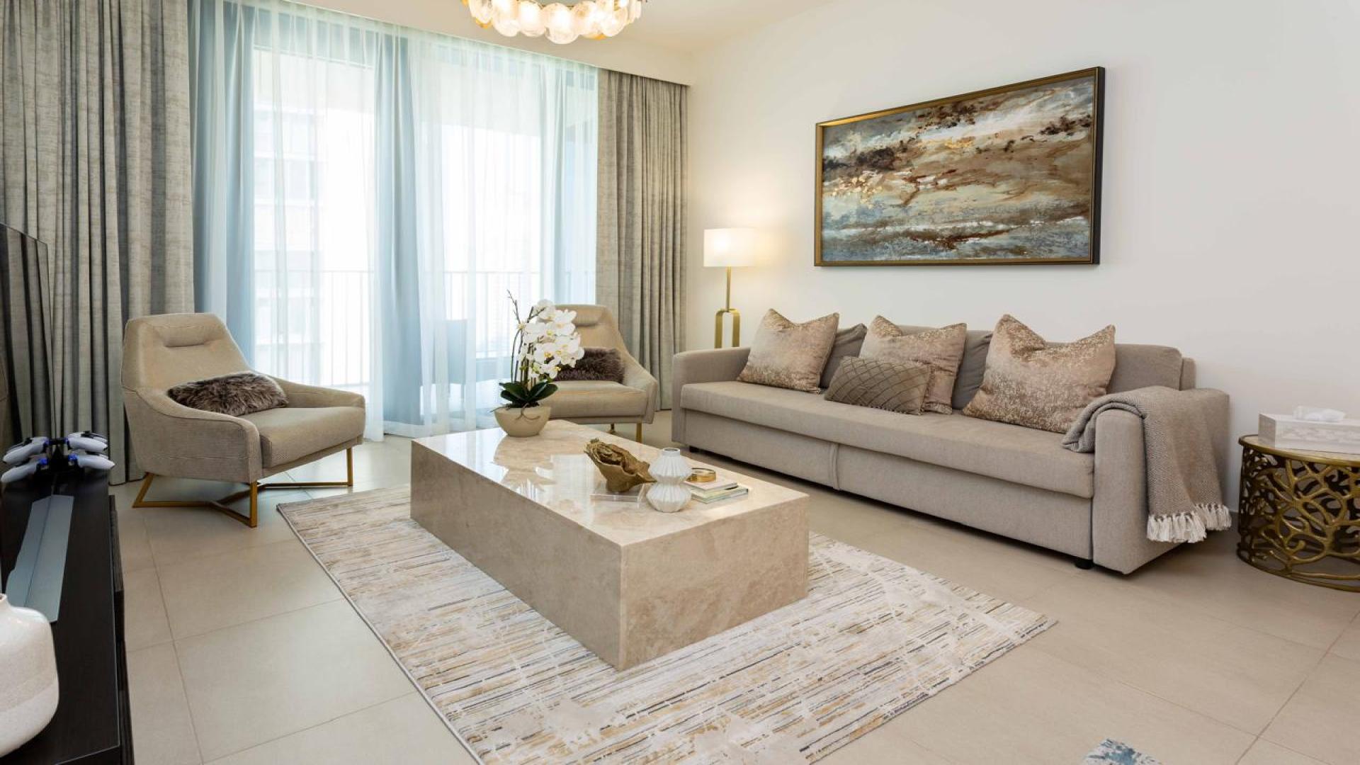 Modern living room in BLVD Heights apartment, Downtown Dubai, with elegant dining and seating area