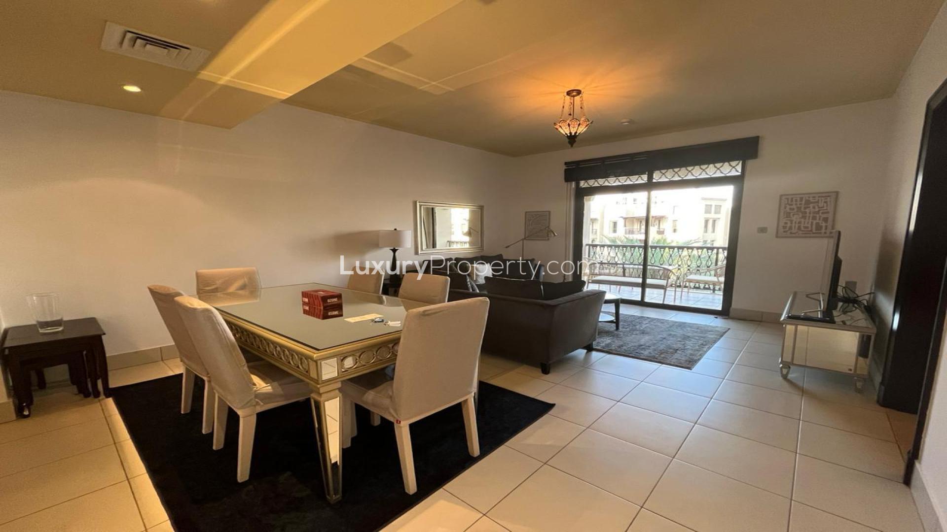 Furnished kitchen in Reehan apartment, Old Town, with modern cabinetry and tiled backsplash