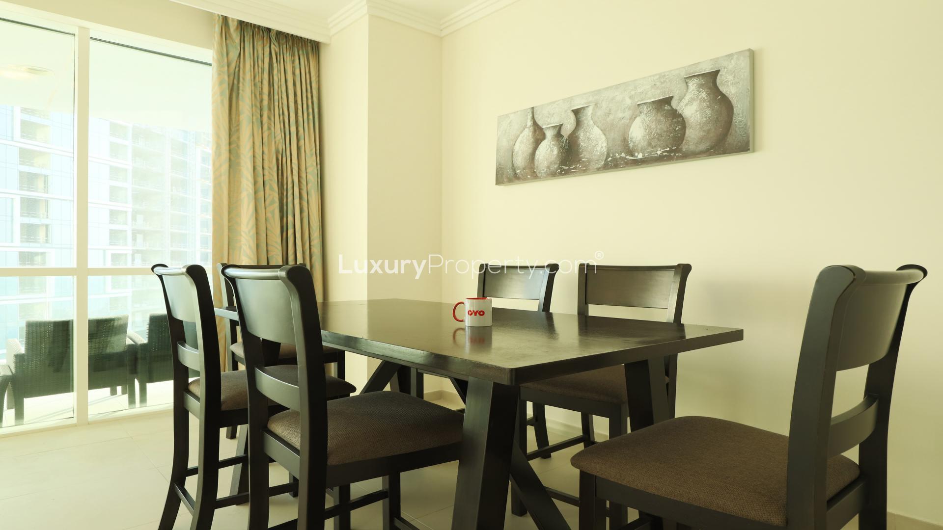 Bright living room in JBR apartment, Al Bateen Residences, with modern furnishings and sea view