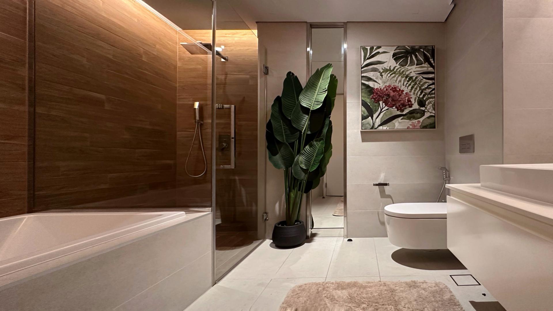 Luxurious bathroom in Bluewaters Residence apartment with modern design and elegant decor