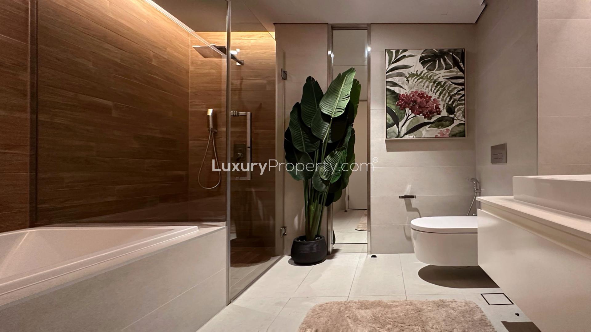 Two-Bedroom Waterfront Apartment in Bluewaters Residence, Dubai with lush gardens and modern design