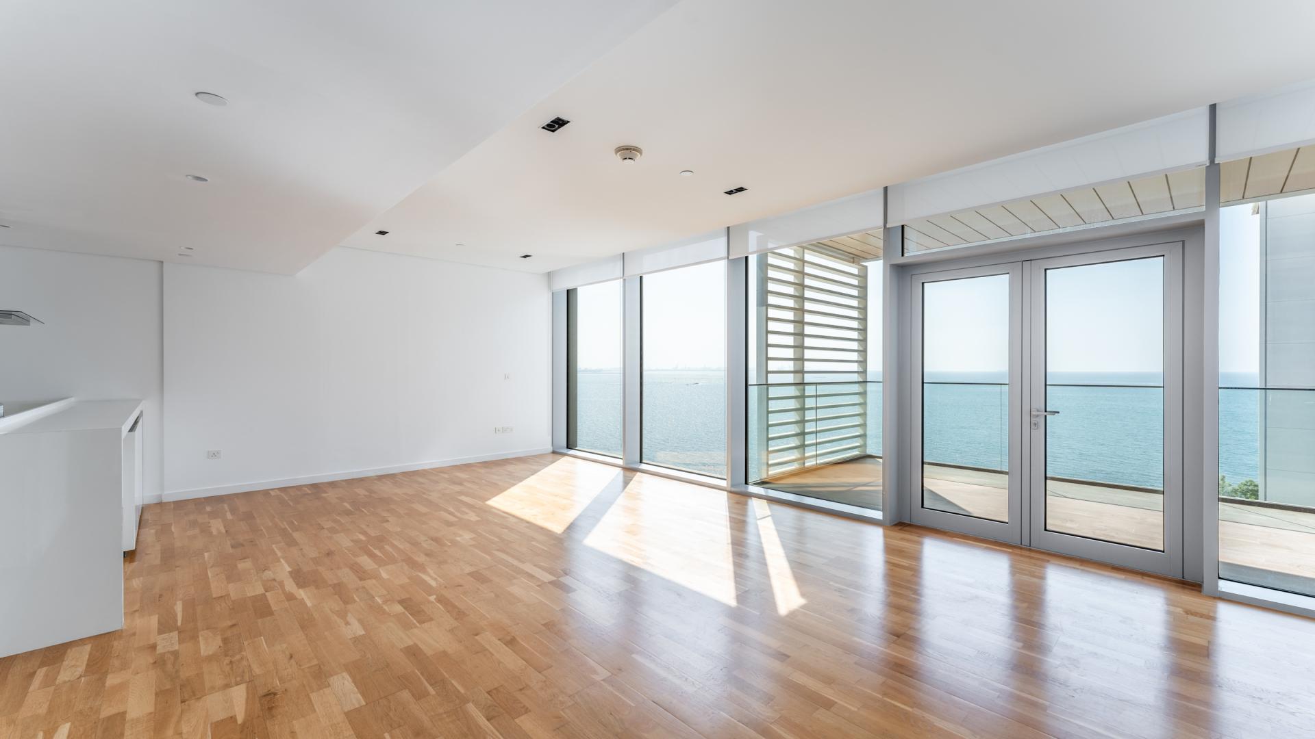 Luxurious Bluewaters apartment with sea view, pool, and lush greenery for sale