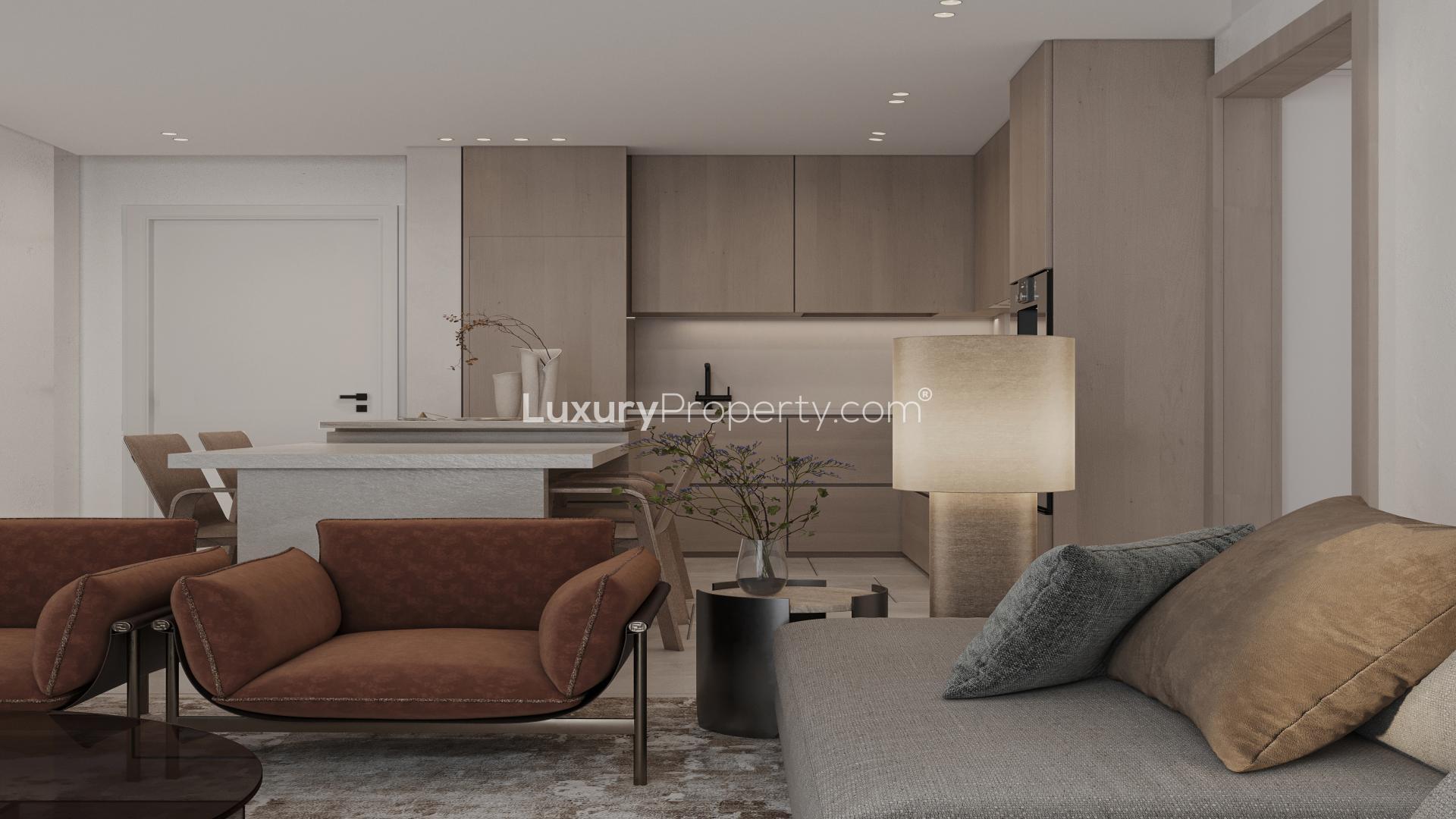 Luxurious bedroom in Aveline Residences, Jumeirah Village Circle, featuring modern decor and amenities