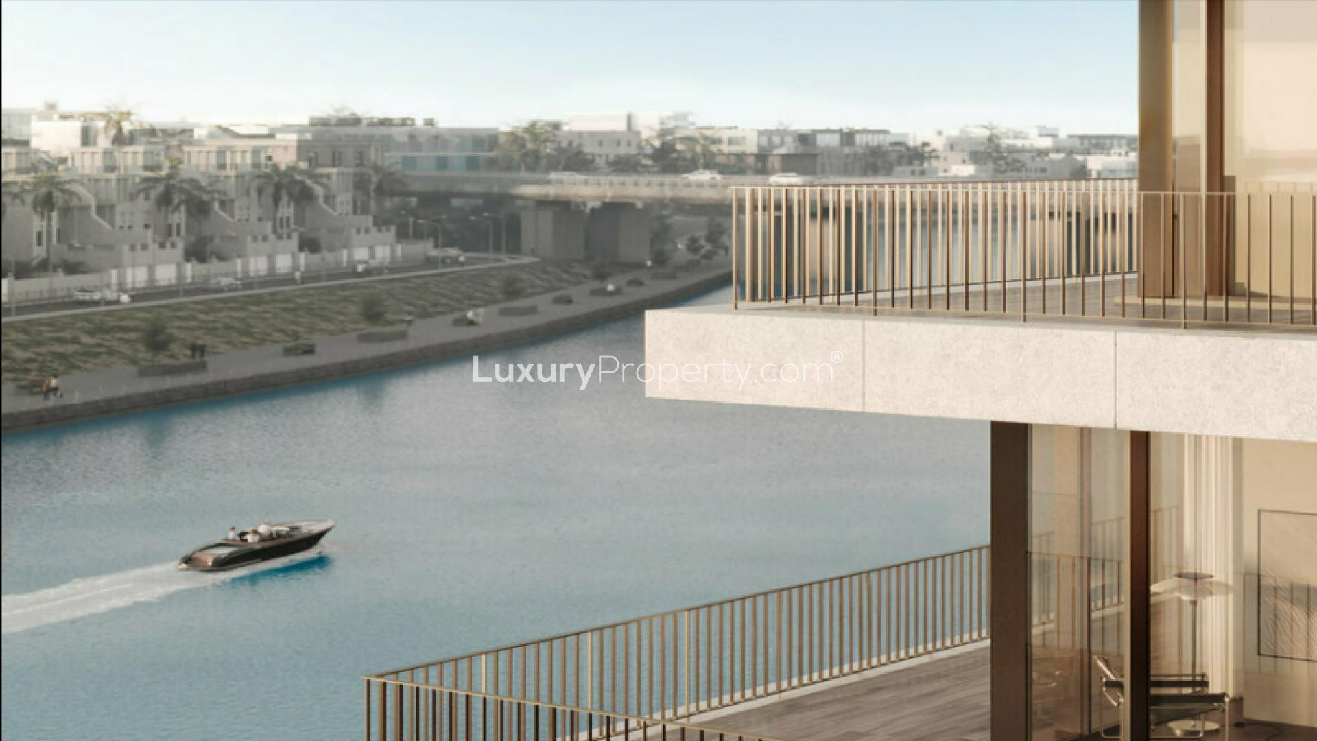 "Balcony view of canal from 2-bedroom apartment in Eden House, Al Satwa.",Luxurious bedroom in Eden House apartment, Al Satwa, featuring modern design and cozy decor