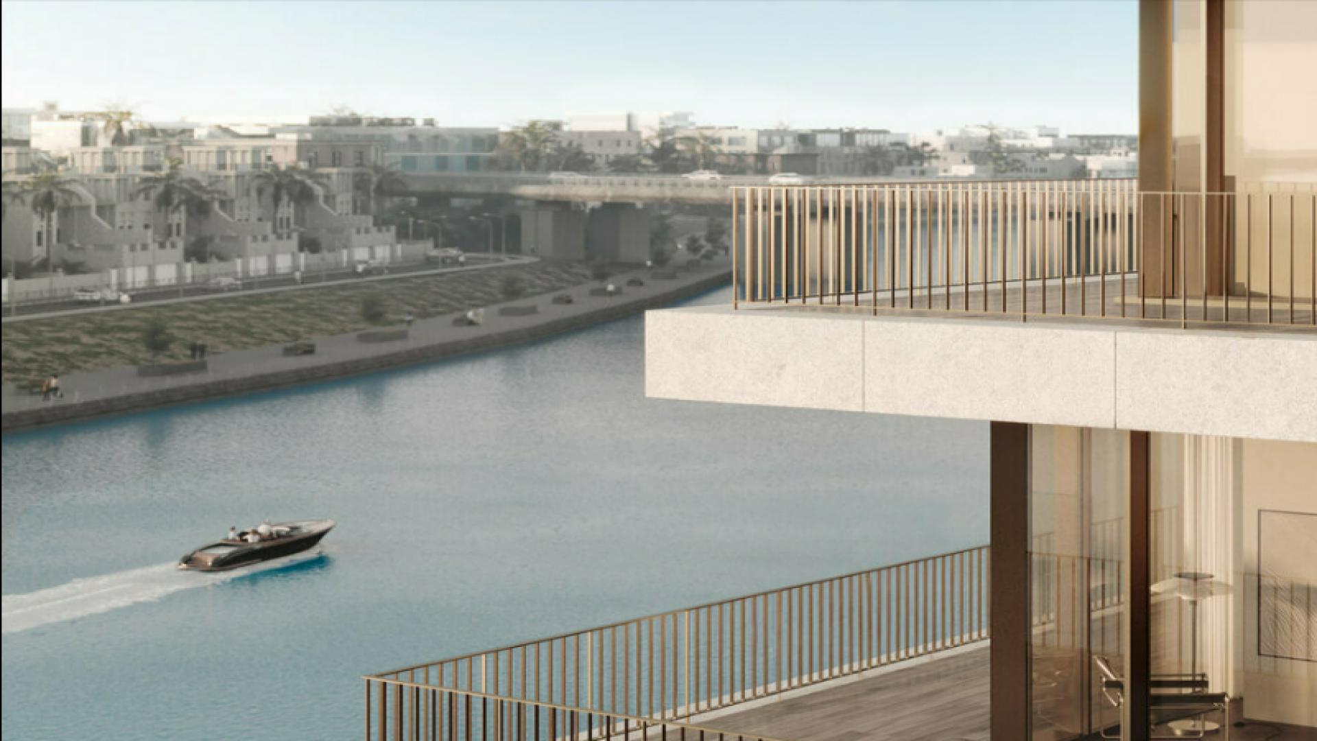 "Balcony view of canal from 2-bedroom apartment in Eden House, Al Satwa.",Luxurious bedroom in Eden House apartment, Al Satwa, featuring modern design and cozy decor