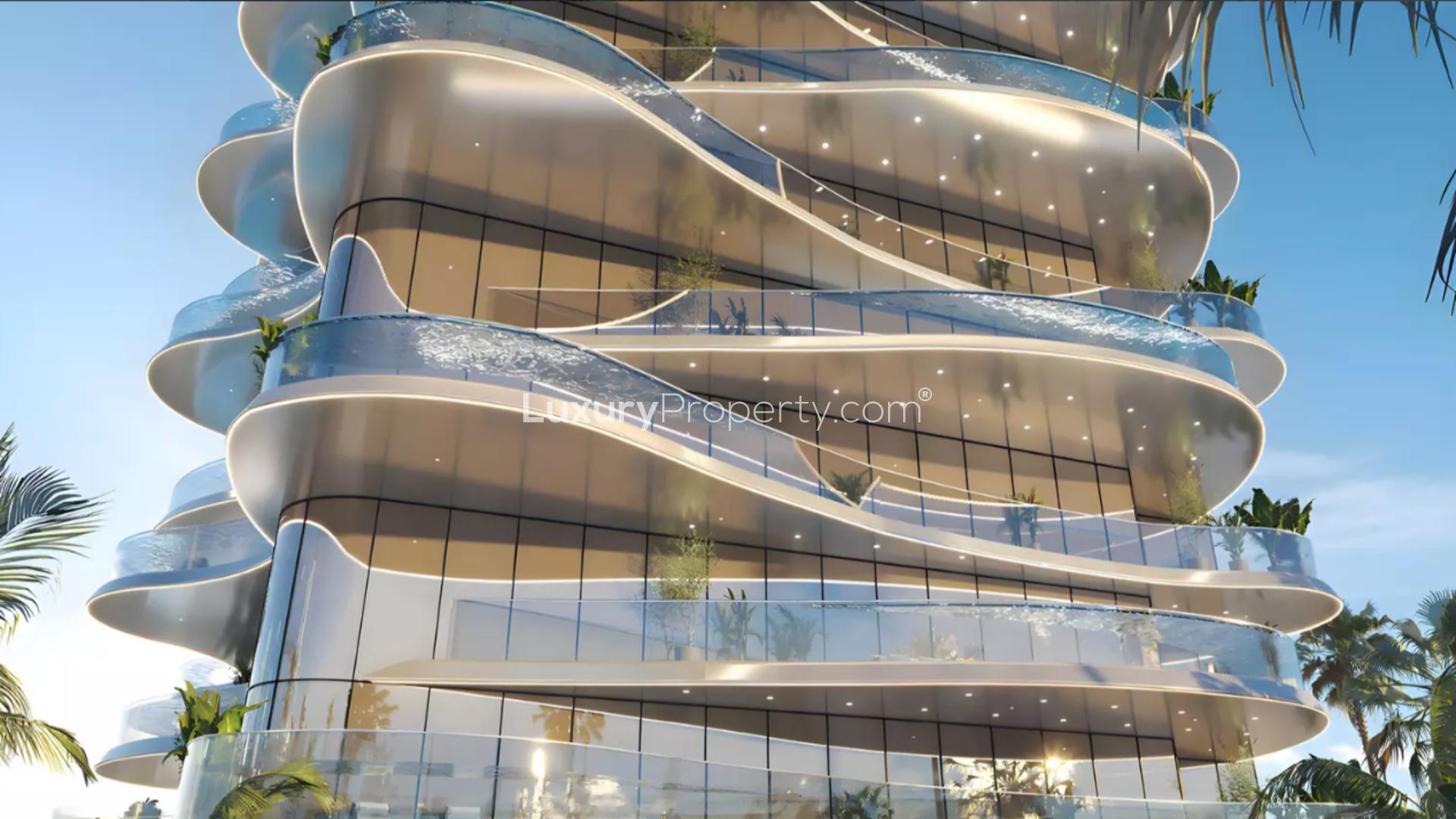 "Elegant lobby of Volga Tower apartment in Jumeirah Village Triangle for sale.","Modern architectural design of Volga Tower apartment in Jumeirah Village Triangle for sale.",Lobby of Volga Tower apartment in Jumeirah Village Triangle with modern art and sculpture