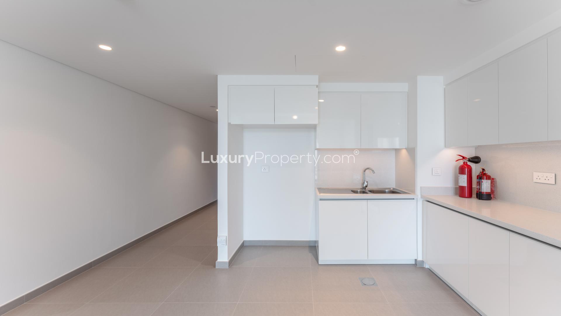 Modern open-plan living area in Downtown Dubai apartment for sale, spacious and bright