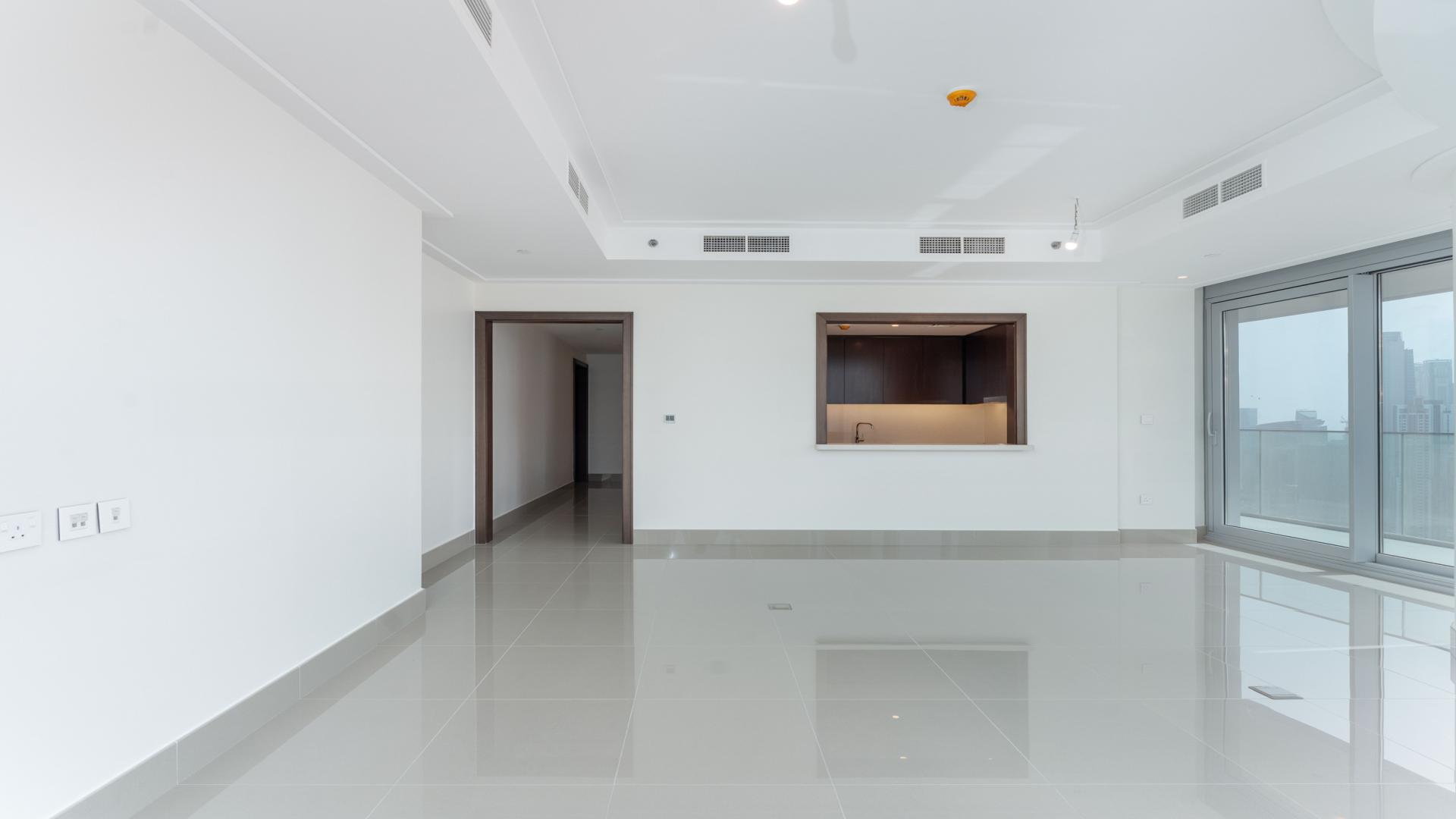 Bright, spacious apartment interior in Opera District, Downtown Dubai, featuring large windows and modern design