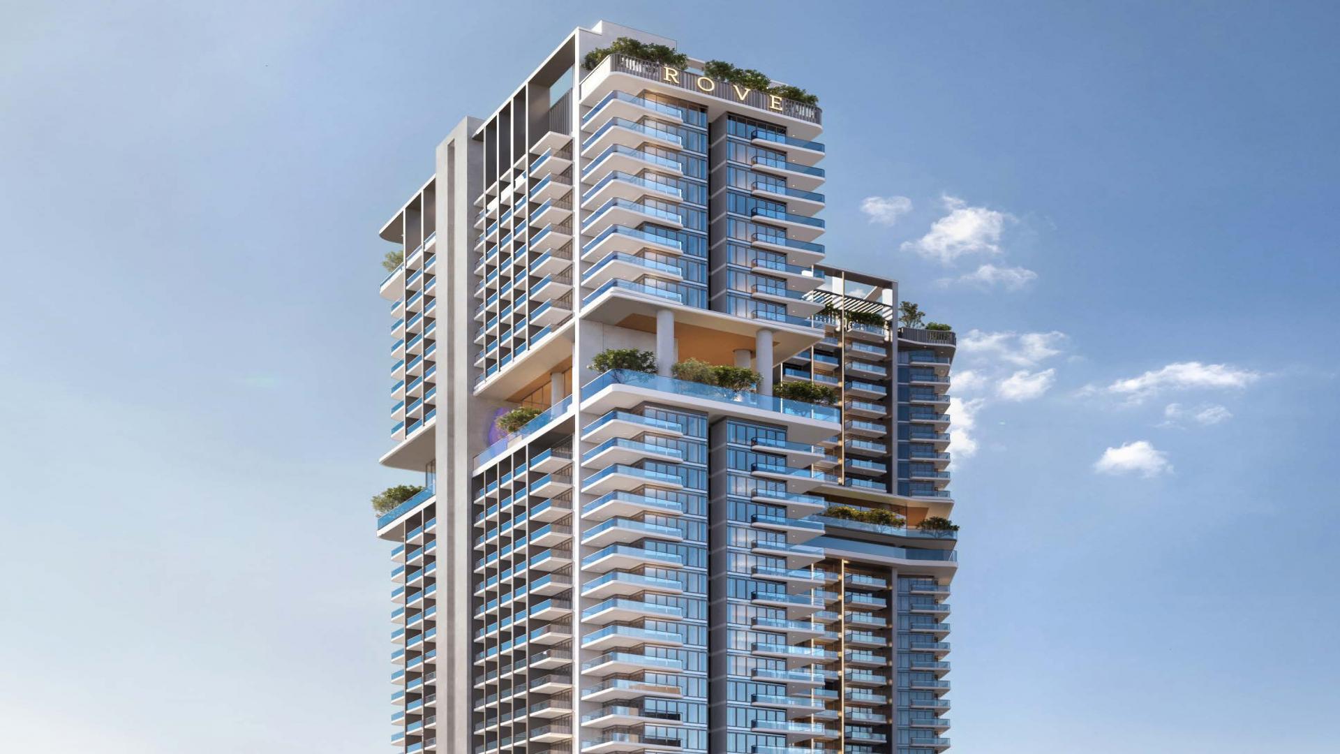 Modern living room and kitchen in 2-bedroom Rove Home apartment, Business Bay, for sale