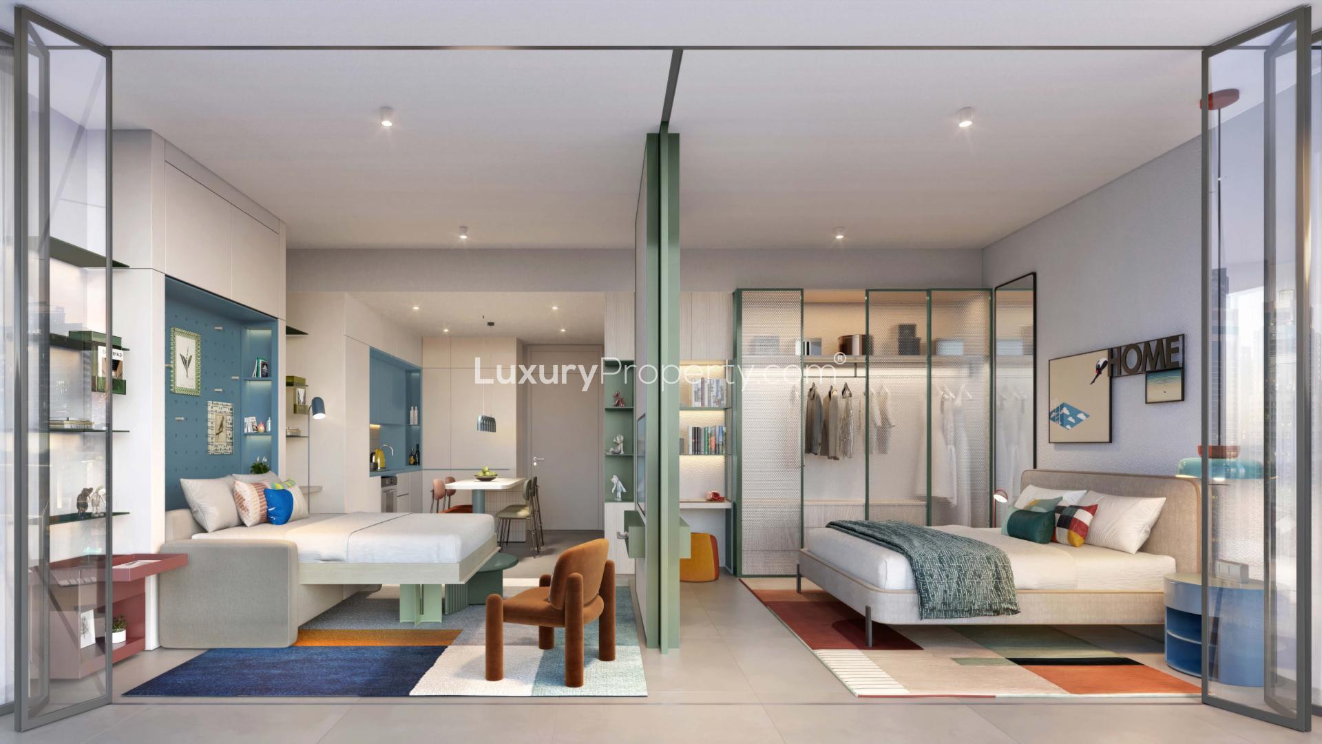 Tall modern apartment building at Rove Home, Business Bay, Dubai, with balconies and sky views