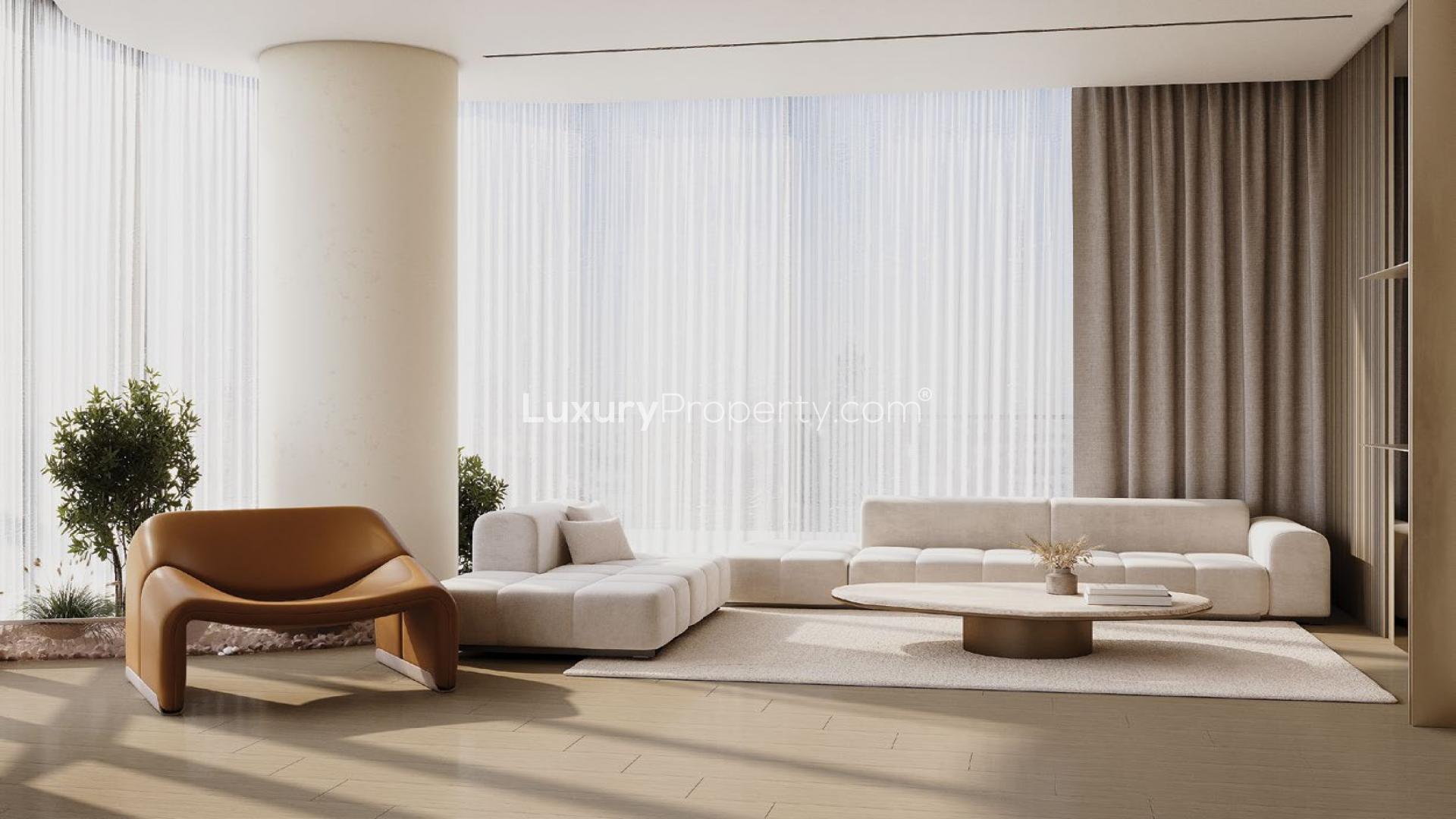 Luxurious Binghatti Hills apartment building at night in Dubai Science Park