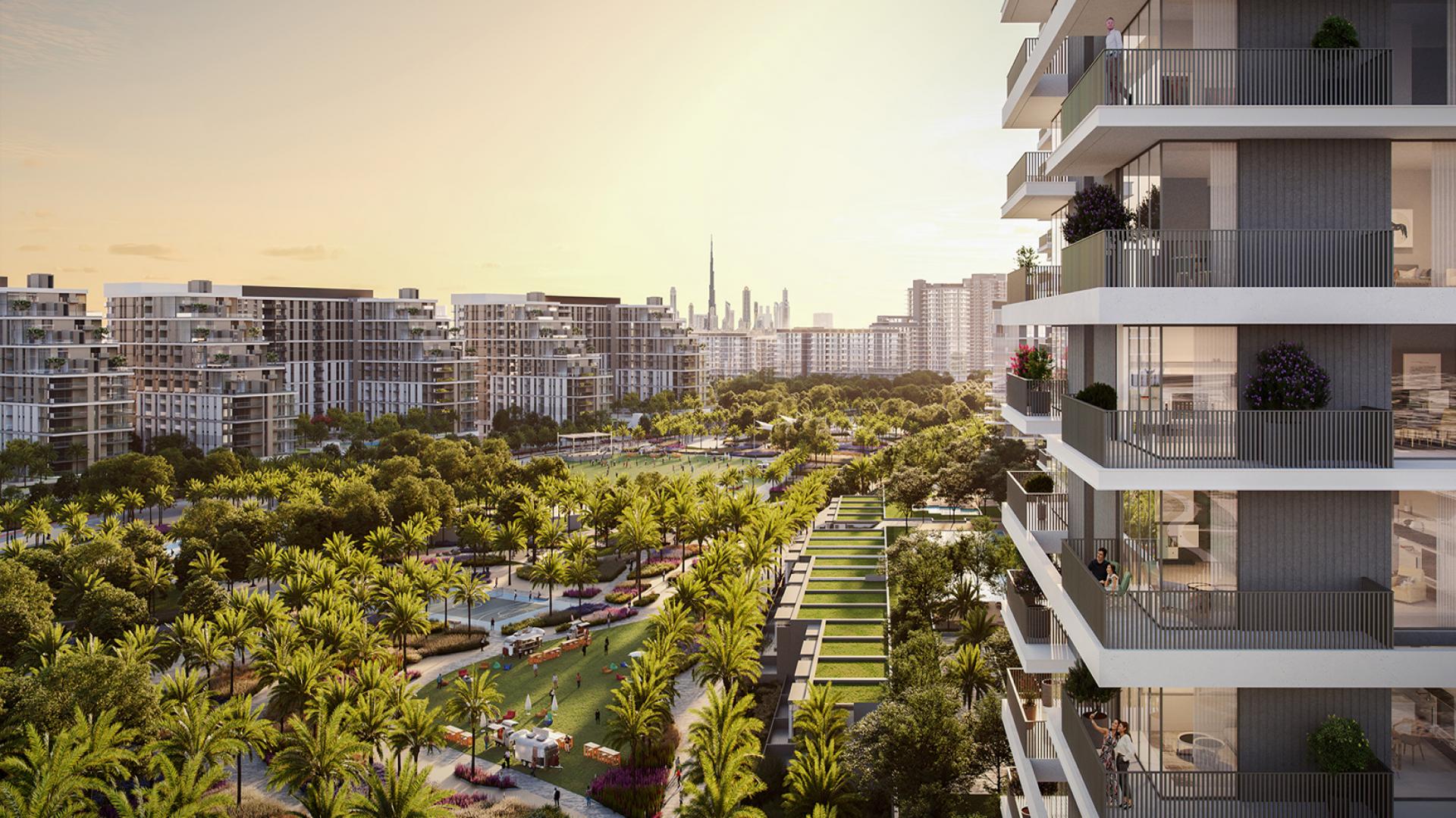 Outdoor pool and lush greenery at Palace Residences, Dubai Hills Estate apartment complex