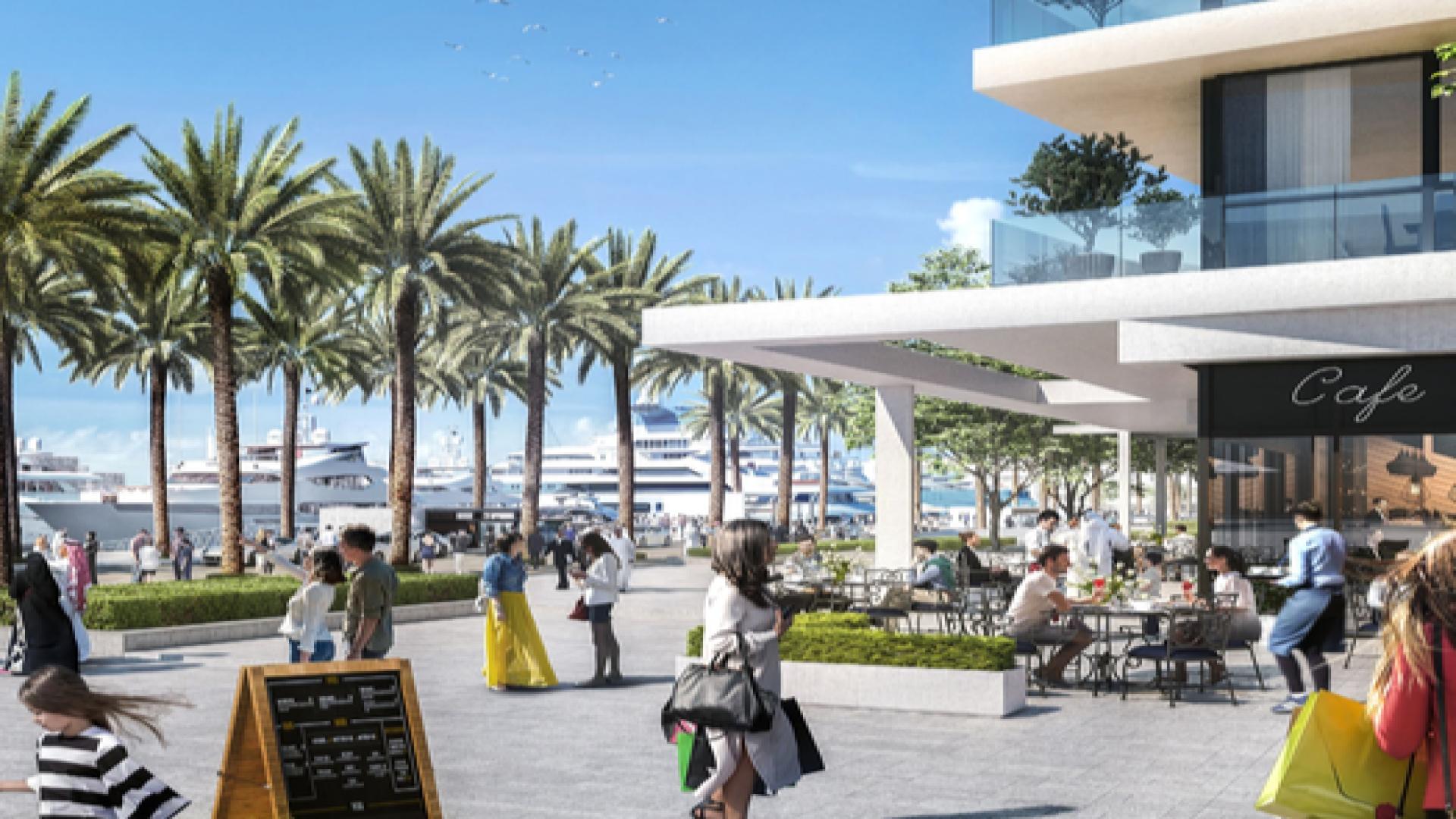 Elegant Ocean Cove apartment view with pool and garden, Rashid Yachts and Marina, Dubai