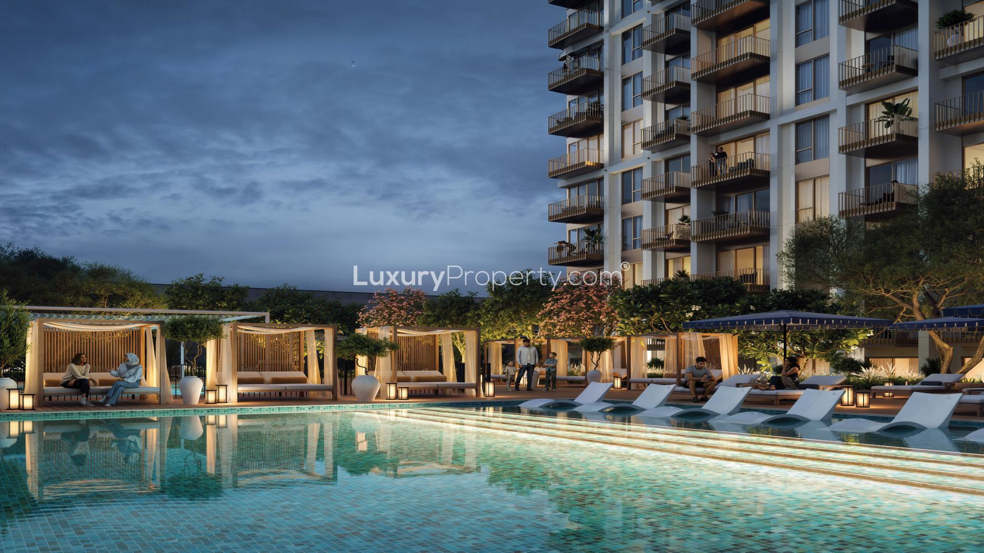 Modern living room in 2-bedroom apartment, Dubai Creek Harbour, overlooking scenic balcony view