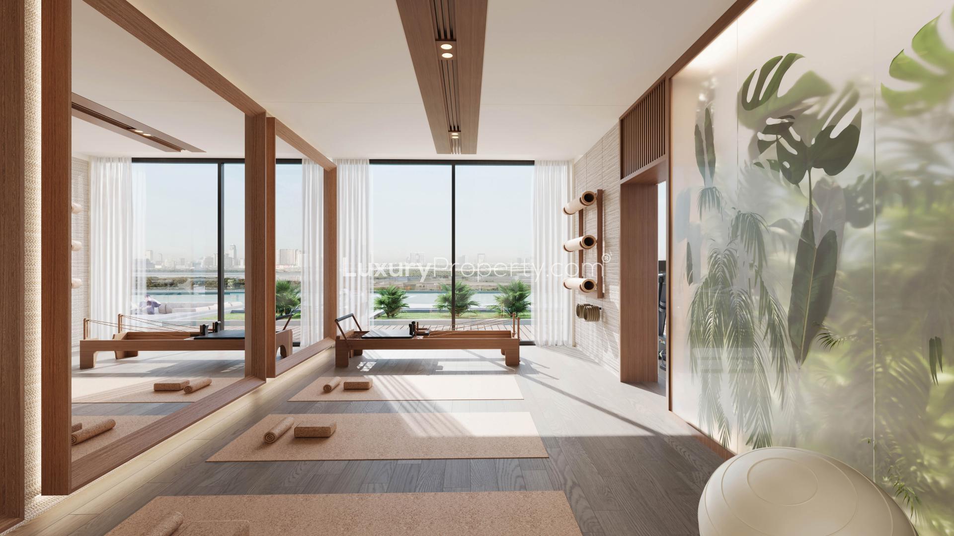 Modern living room in Belgrove Residences, MBR City with cityscape views and elegant decor