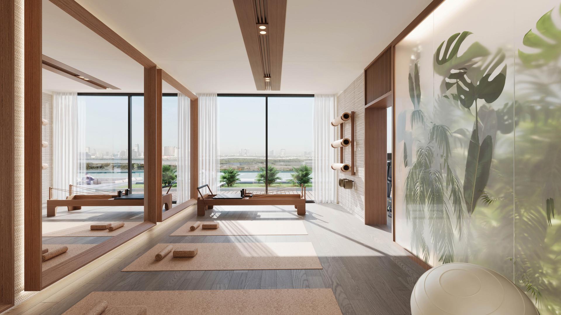 Modern living room in Belgrove Residences, MBR City with cityscape views and elegant decor