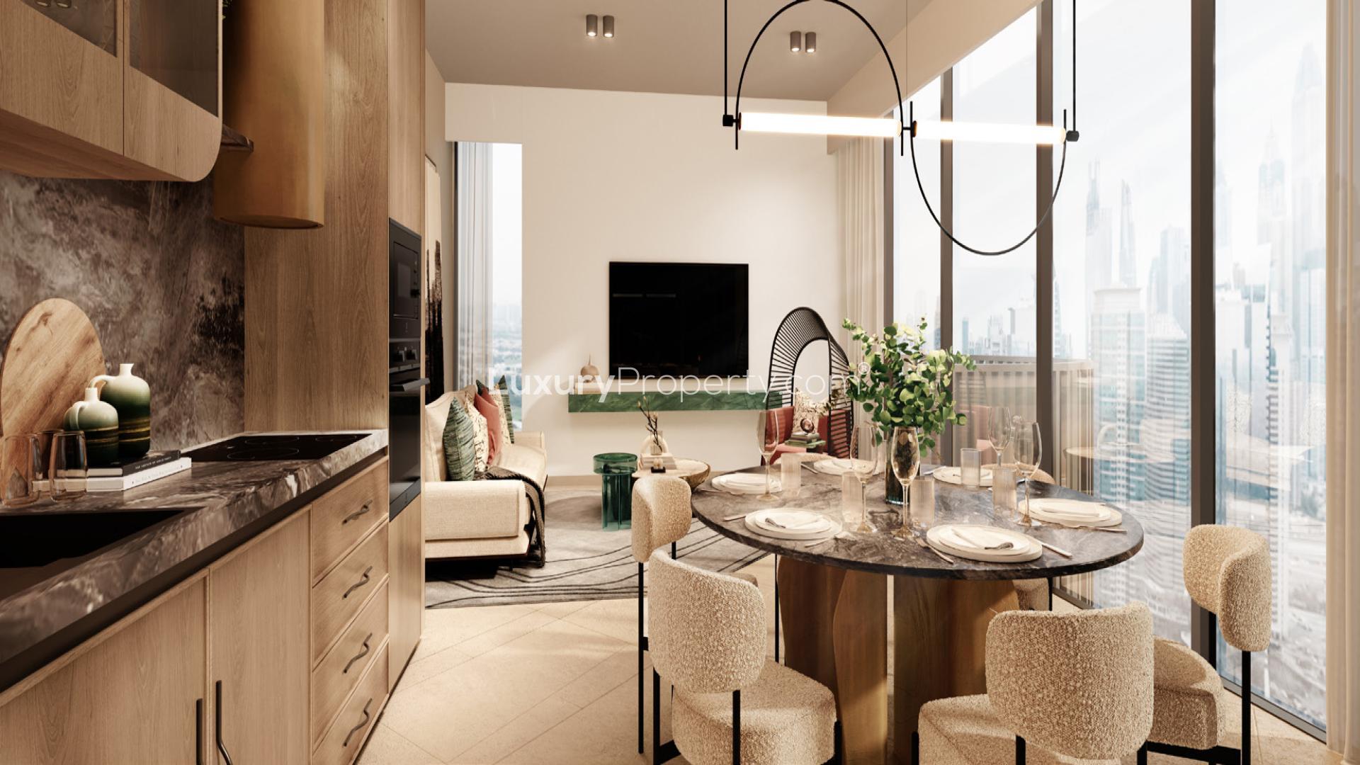 Tall modern apartment building in W Residences, Jumeirah Lake Towers, surrounded by greenery