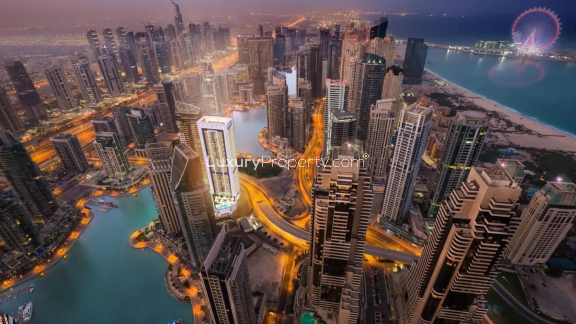 Modern Dubai Marina skyline view with yachts and palm trees in Pelagos community