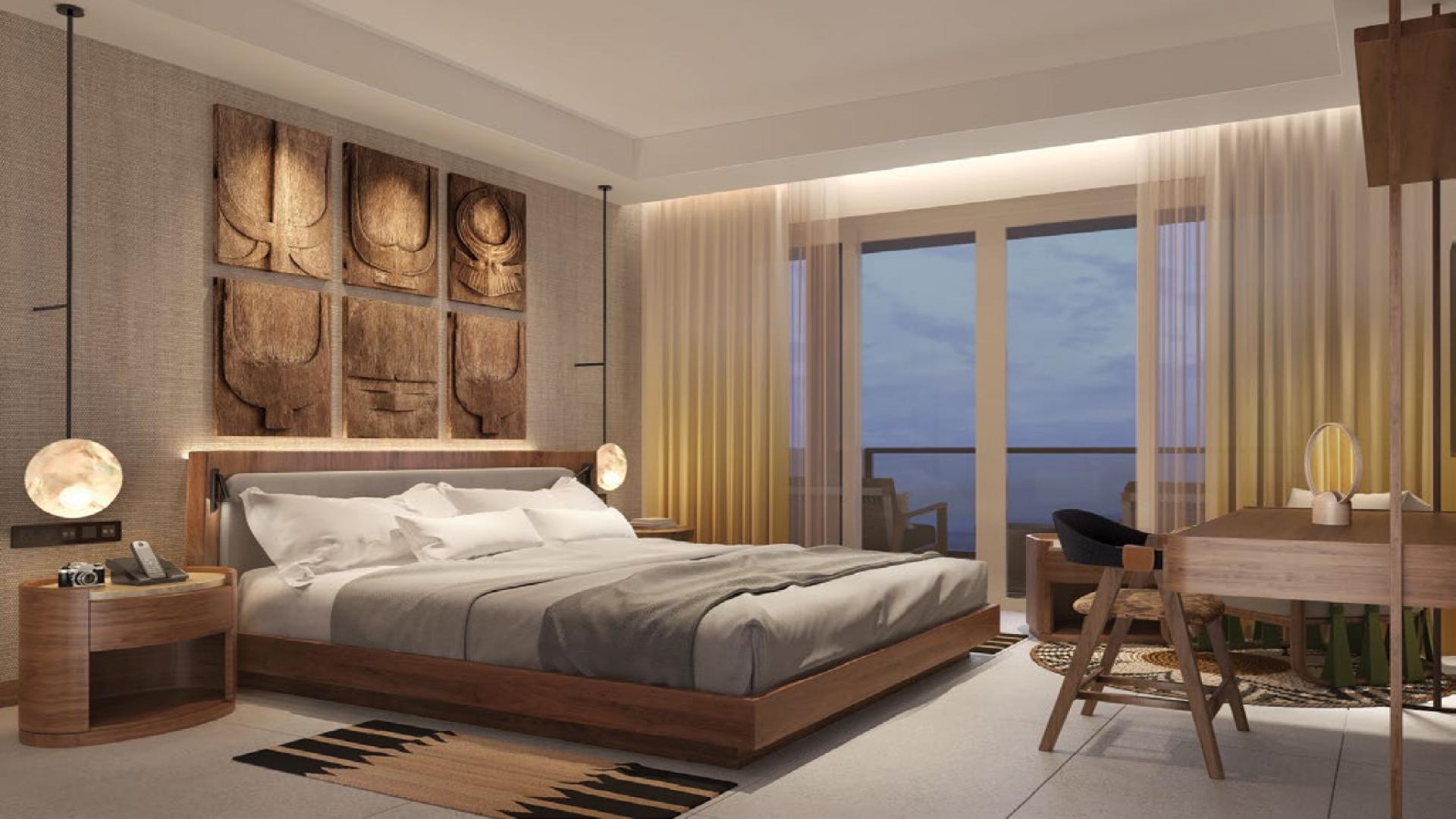 Stunning Albizya Bay apartment complex with pool, lush greenery, and luxury amenities in Mahe Island