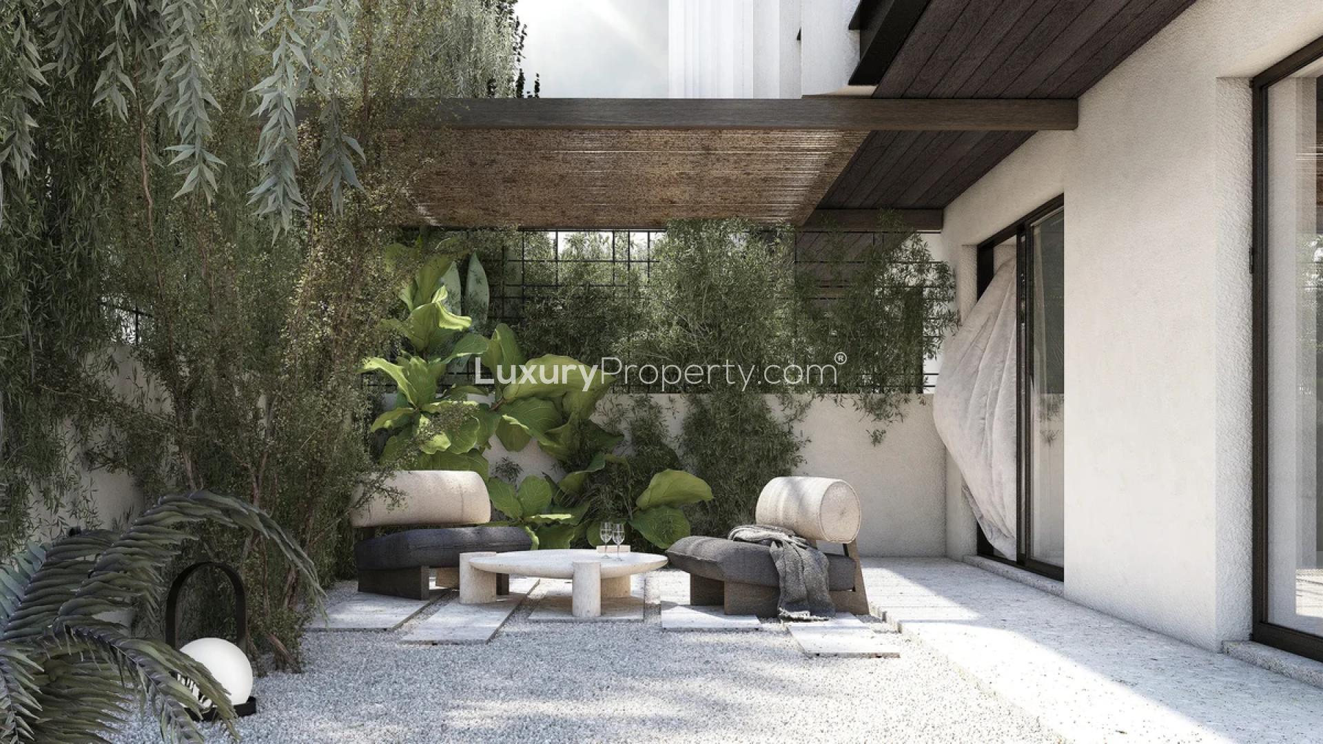 Contemporary apartment building exterior in Iliso Suites, Athens Riviera, with balconies and modern design