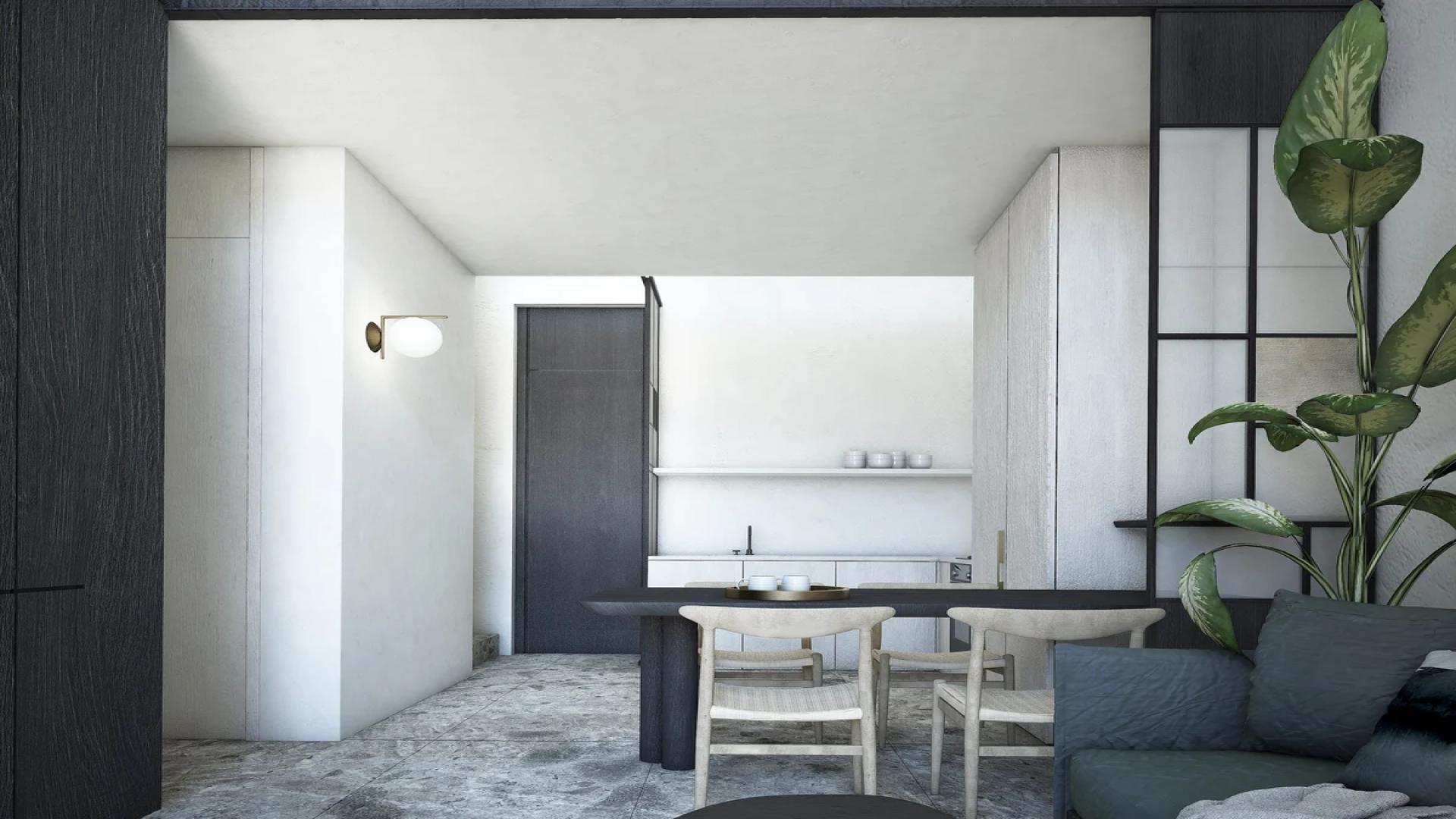 Outdoor seating area with lush greenery at Iliso Suites, Athens Riviera apartment for sale