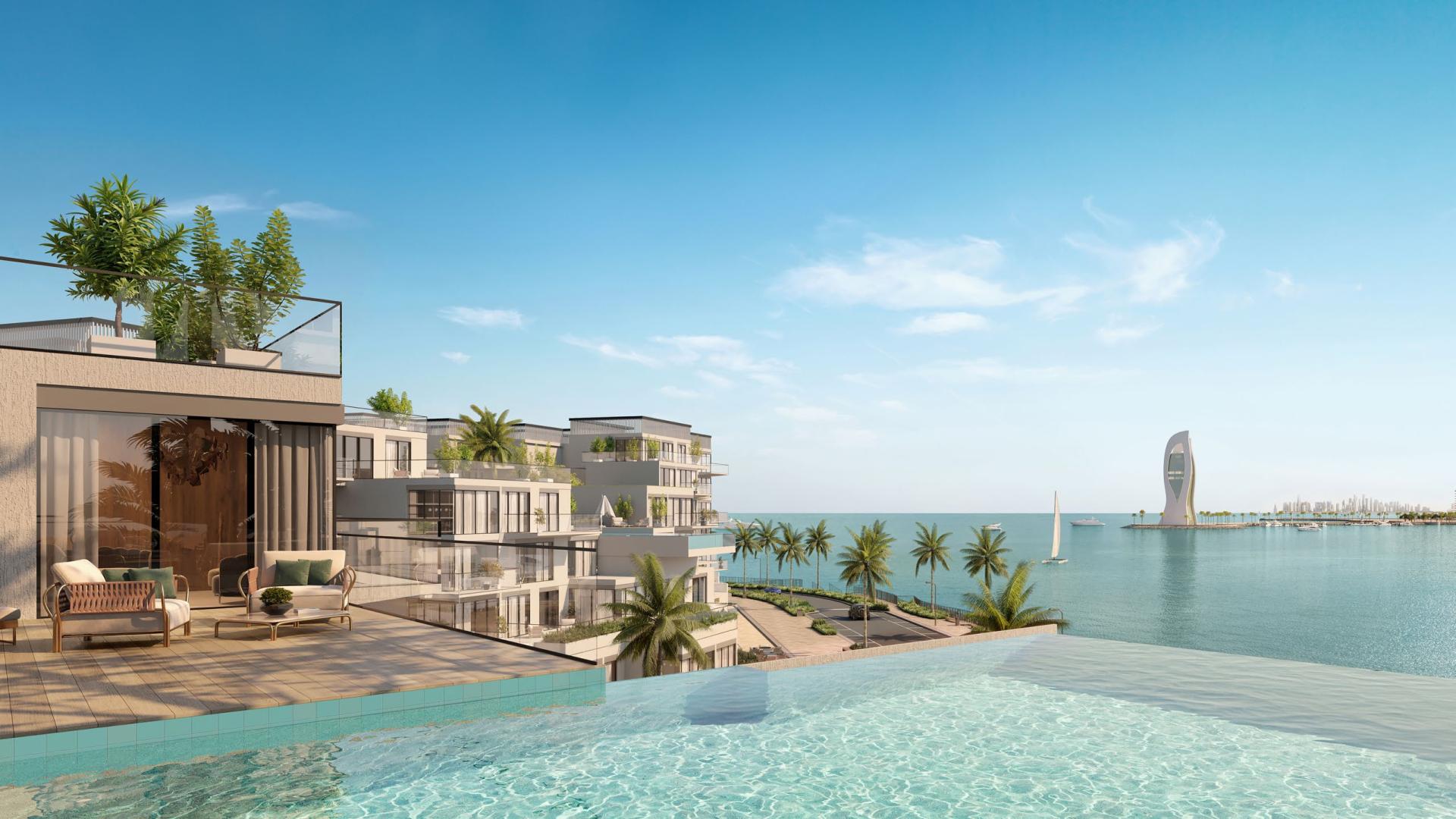 Aerial view of luxury beachfront apartments at Qetaifan, The Weekend 02 by Elie Saab