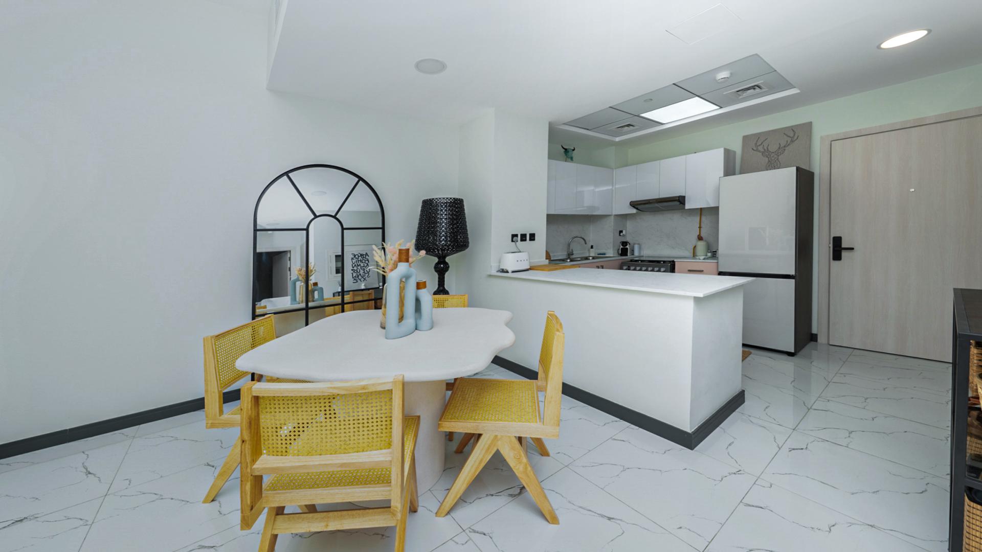 Stylish living room in 2-bedroom apartment, Rukan Tower, Dubai Land, for sale