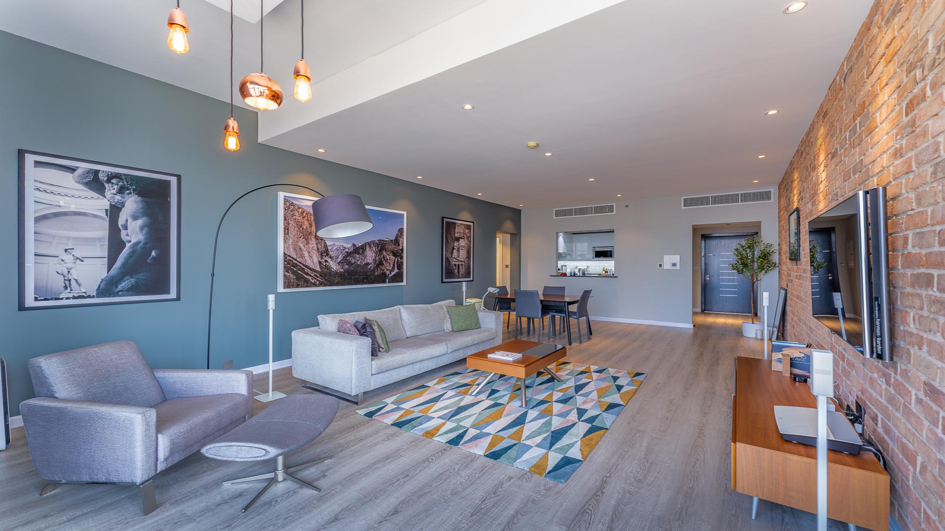 Modern living room in New York loft-style 2-bedroom apartment, JLT Cluster S, Dubai