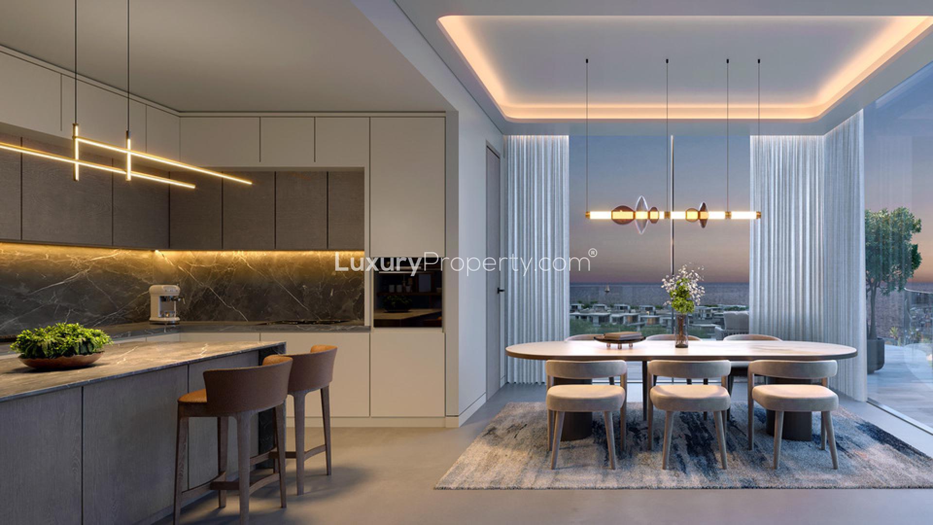 Luxurious living room in AIDA Muscat apartment, featuring modern decor and elegant furnishings