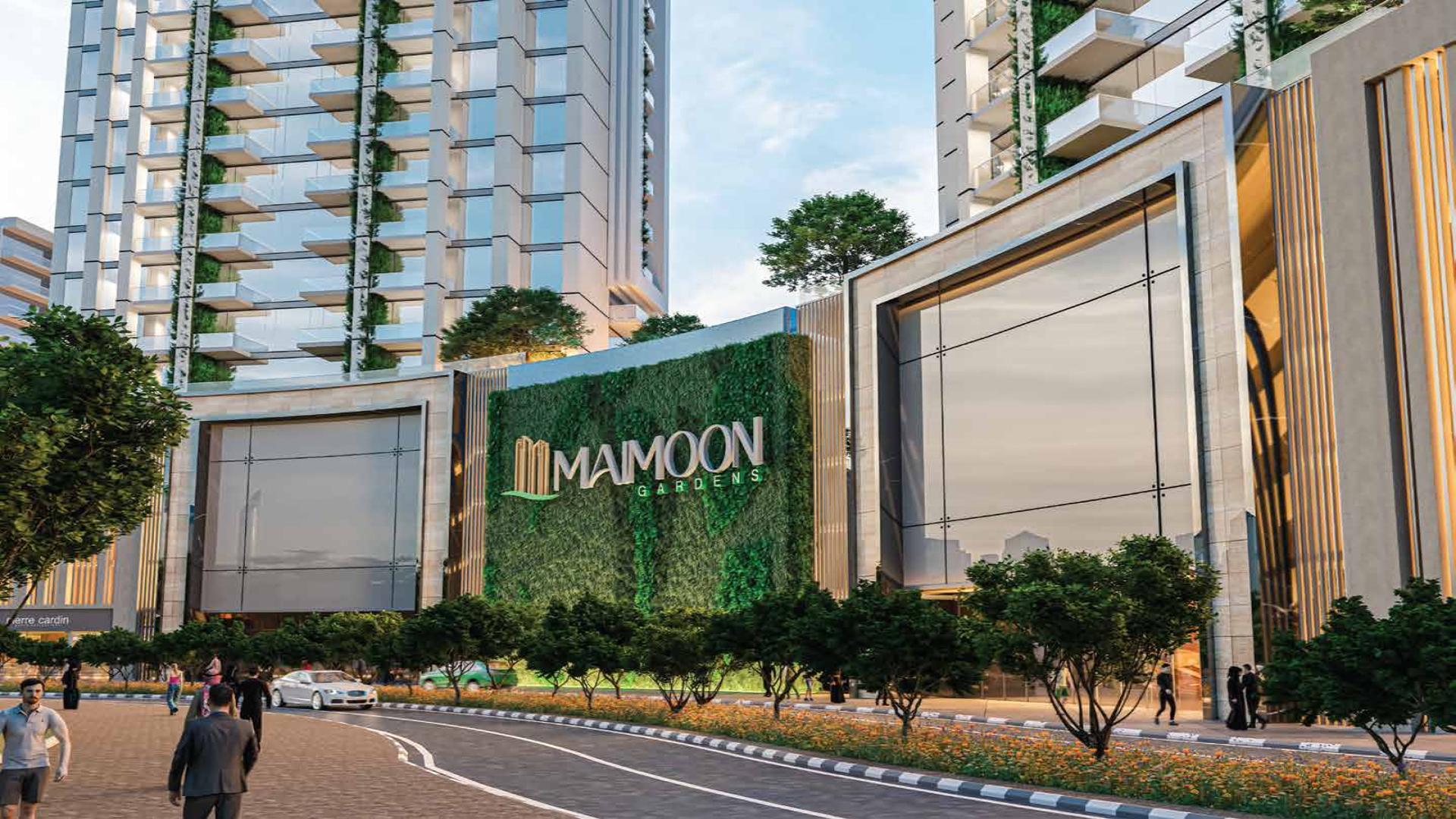 "Modern Maimoon Gardens apartment towers in Jumeirah Village Circle at sunset, Dubai skyline view.",Exterior view of Maimoon Gardens apartment in Jumeirah Village Circle for sale