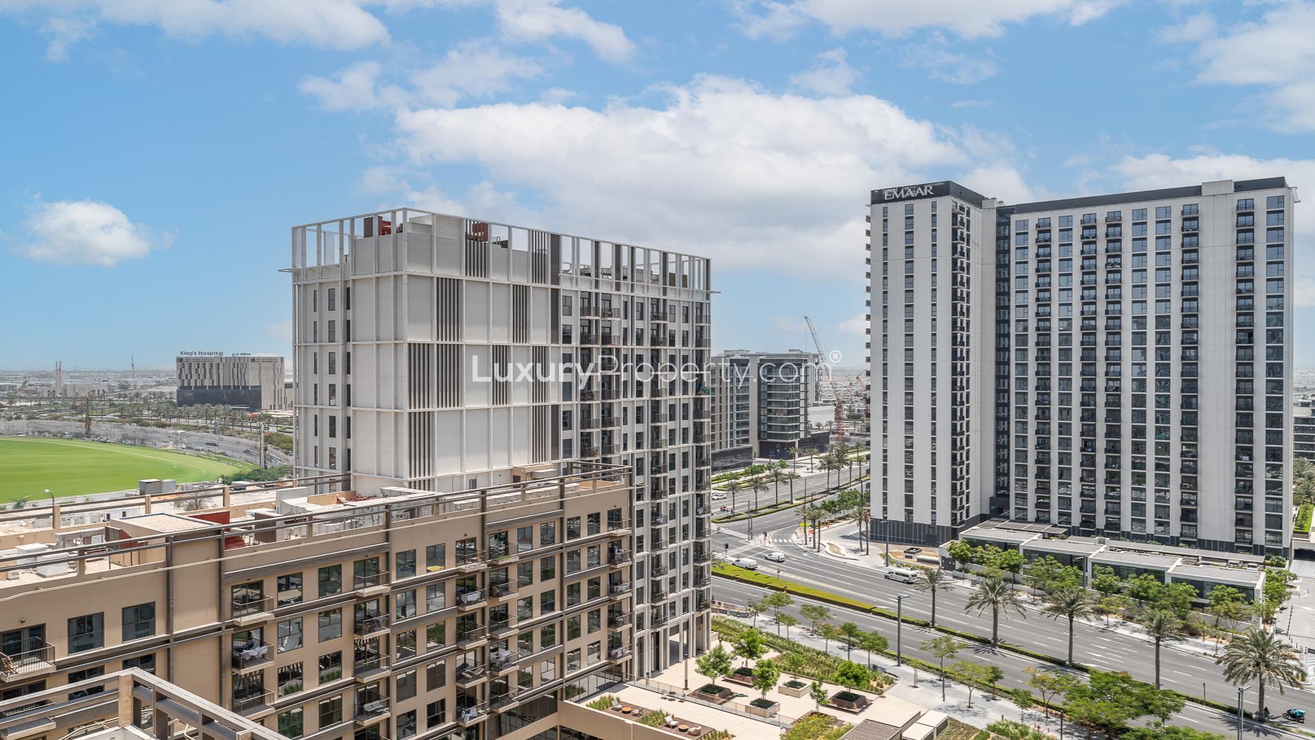 Modern open-plan kitchen and living area in Park Heights apartment, Dubai Hills Estate