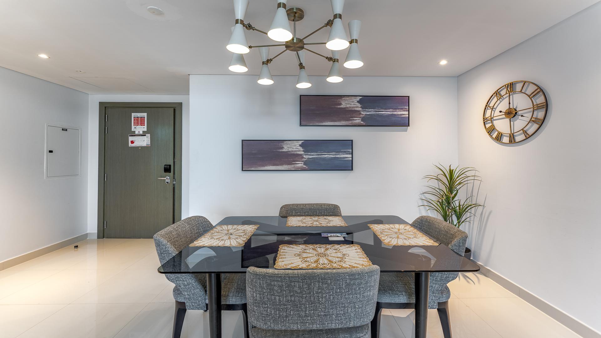 Modern living and dining area in 2-bedroom apartment, Prive by DAMAC, Business Bay