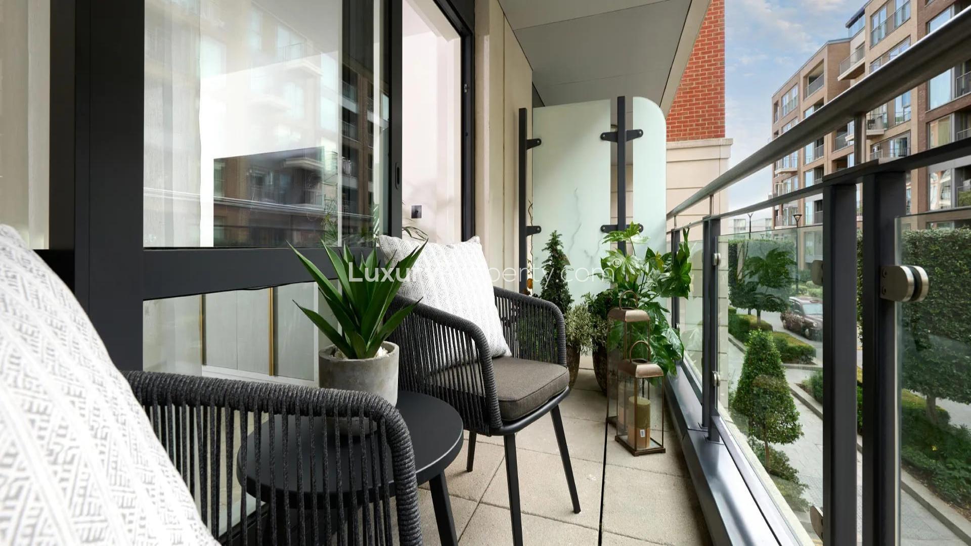 Elegant Chelsea Creek apartment living room with city view, luxury decor, and large windows