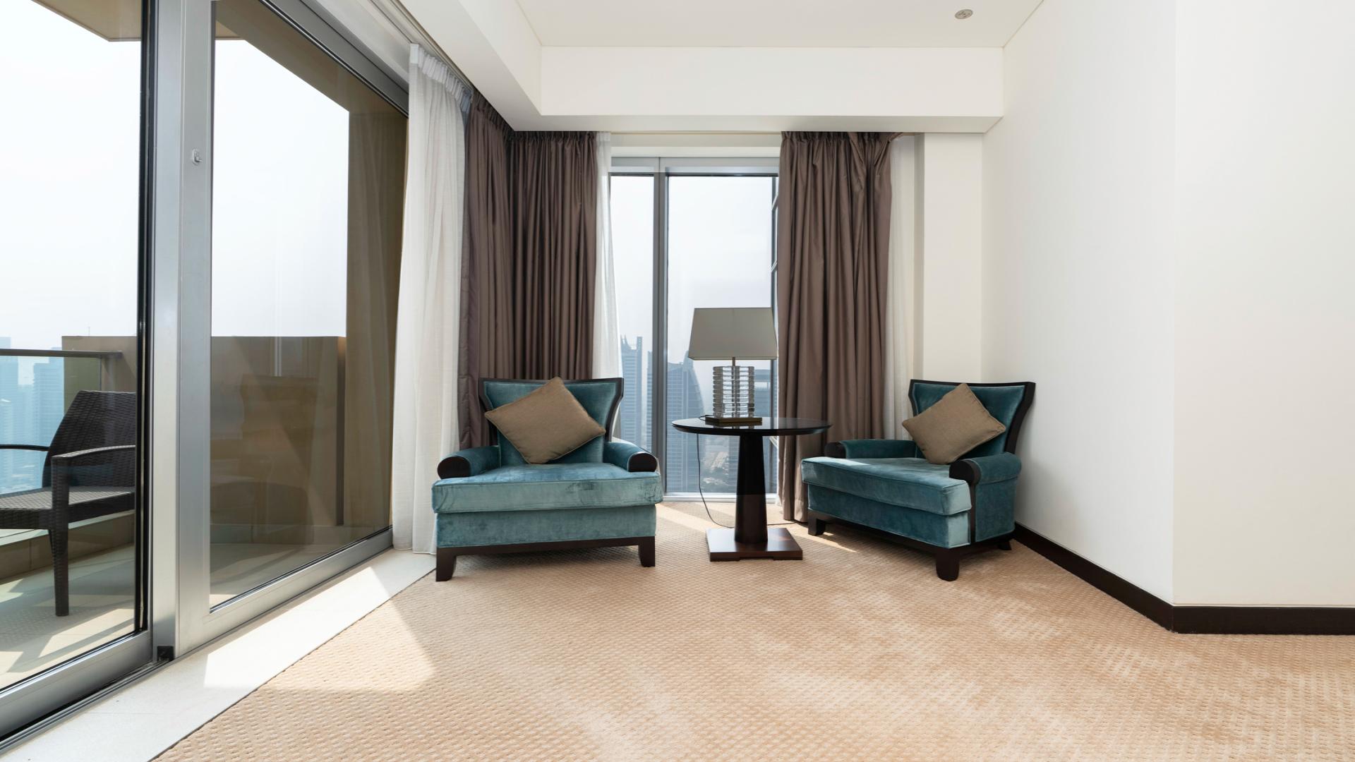 High-floor view of Dubai Marina skyline, showcasing residential towers near JW Marriott Hotel