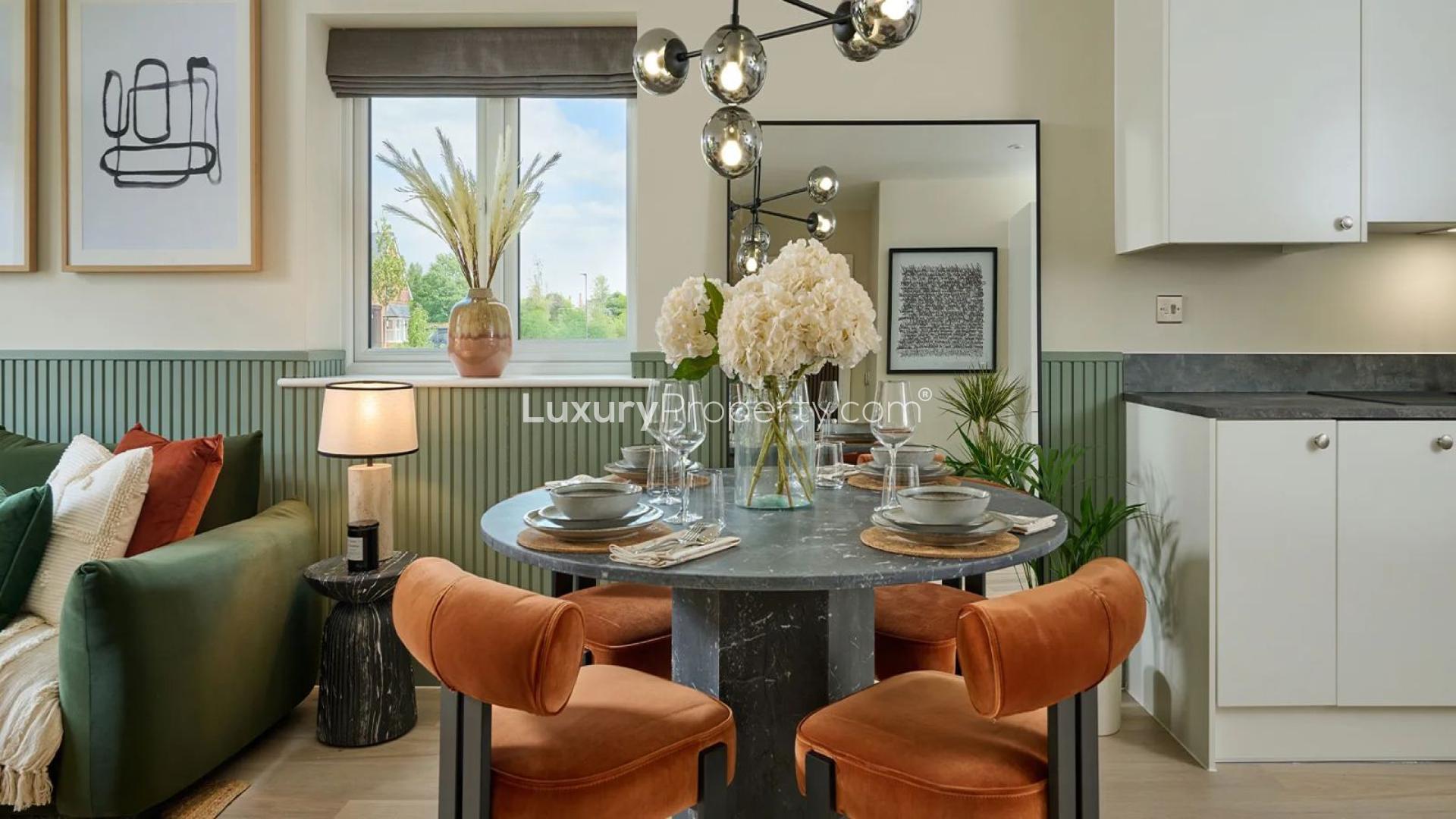 Modern living room and dining area in Highcroft apartment, London, with stylish decor and furniture