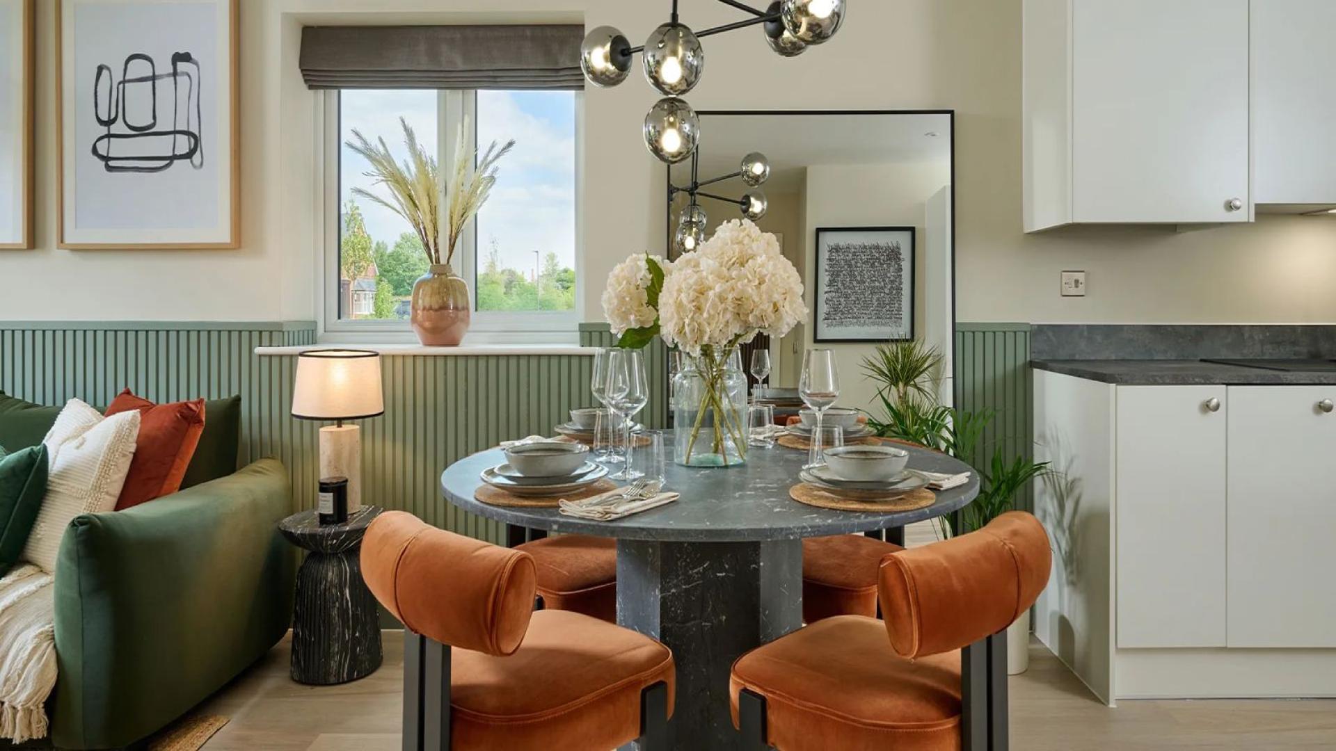 Modern living room and dining area in Highcroft apartment, London, with stylish decor and furniture