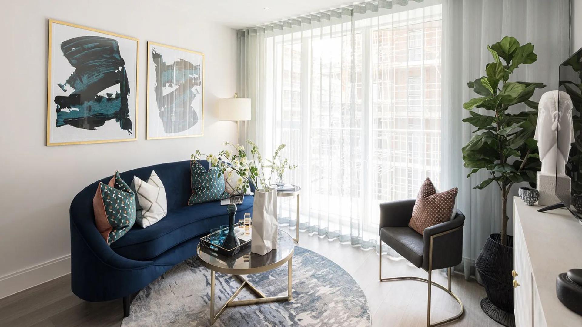 Modern kitchen and living area in Aquifer House apartment, Horlicks Quarter, Slough