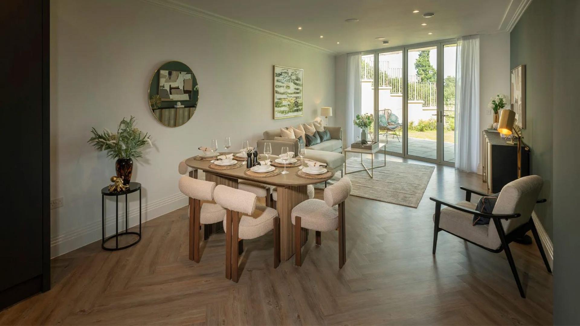 Modern kitchen with island and dining area in The Pavilion, Sunningdale apartment, London