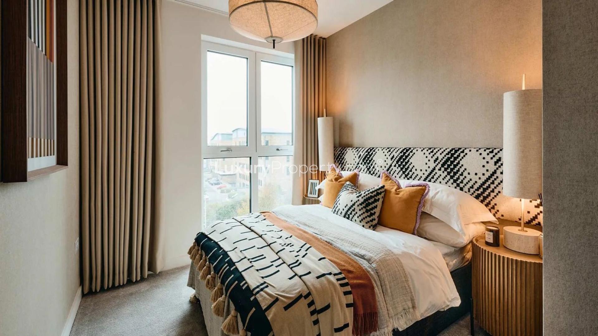 Bright bedroom in 2-bed flat, The Exchange Watford, with large window and modern decor