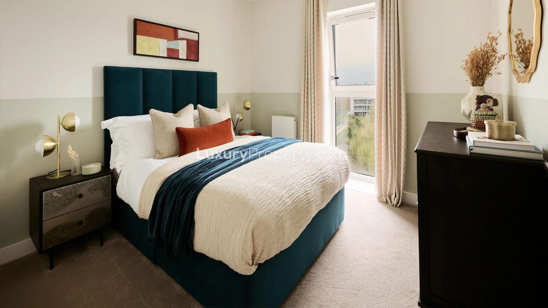 Modern kitchen in two-bed apartment, Bankside Gardens, London, featuring sleek cabinetry and decor