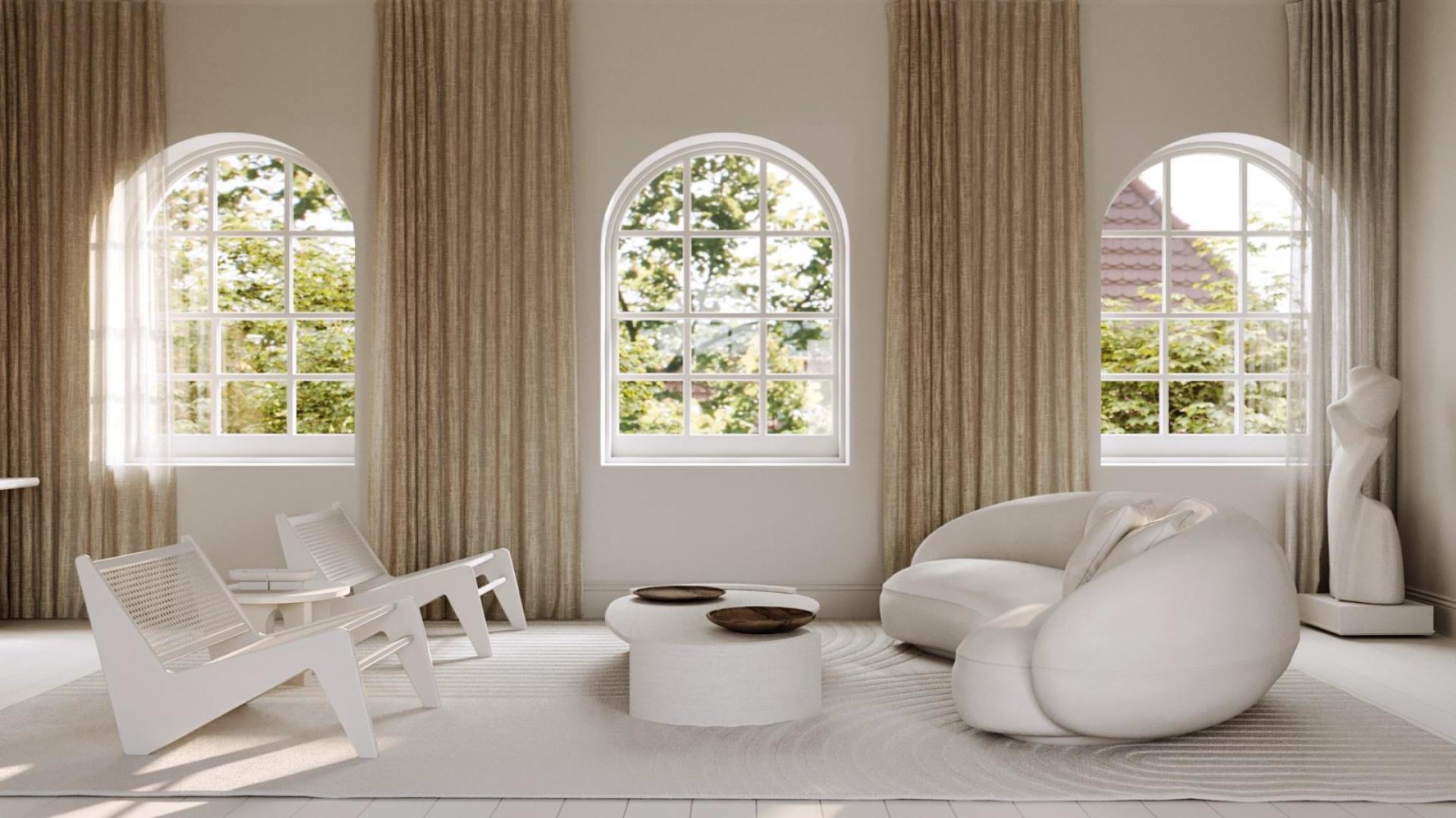 Modern living room in Mapleton House Brook Green apartment, featuring elegant decor and large windows