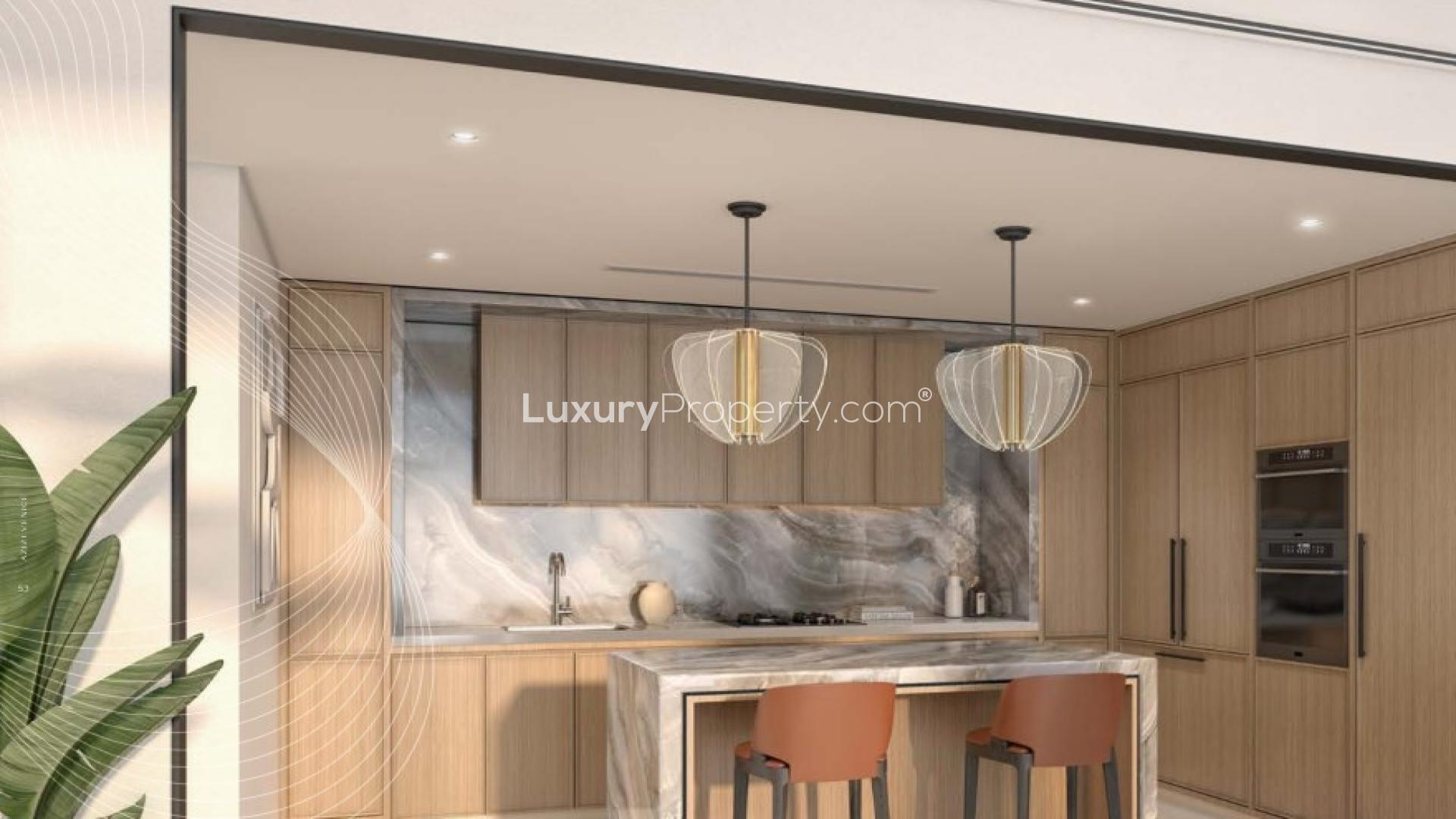 Luxurious dining area with waterfront view in Azizi Venice, Dubai South apartment