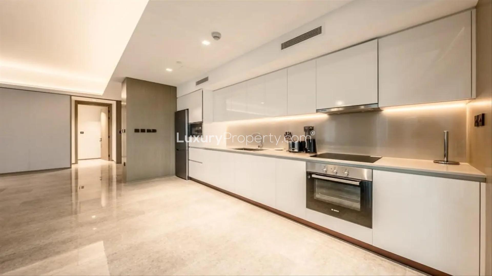 Spacious living area with modern decor in Dubai Creek Harbour apartment, full sea view