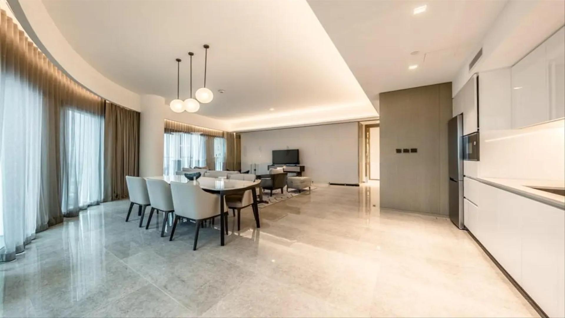 Luxurious living room in large corner unit apartment, Dubai Creek Harbour, with sea view